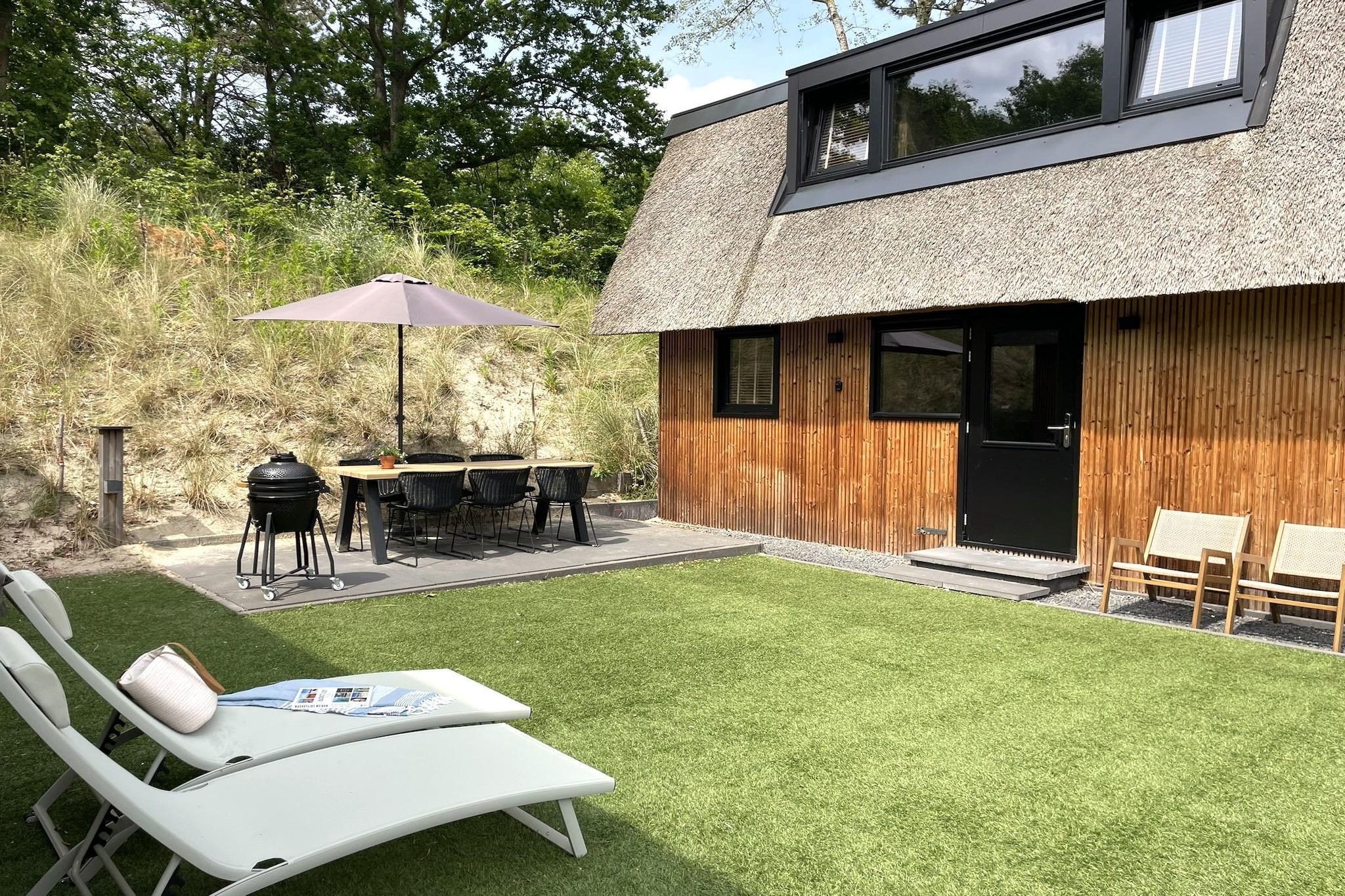 6-person Duinlodge Bosrand with Charging Station - Terrasse/Balkon