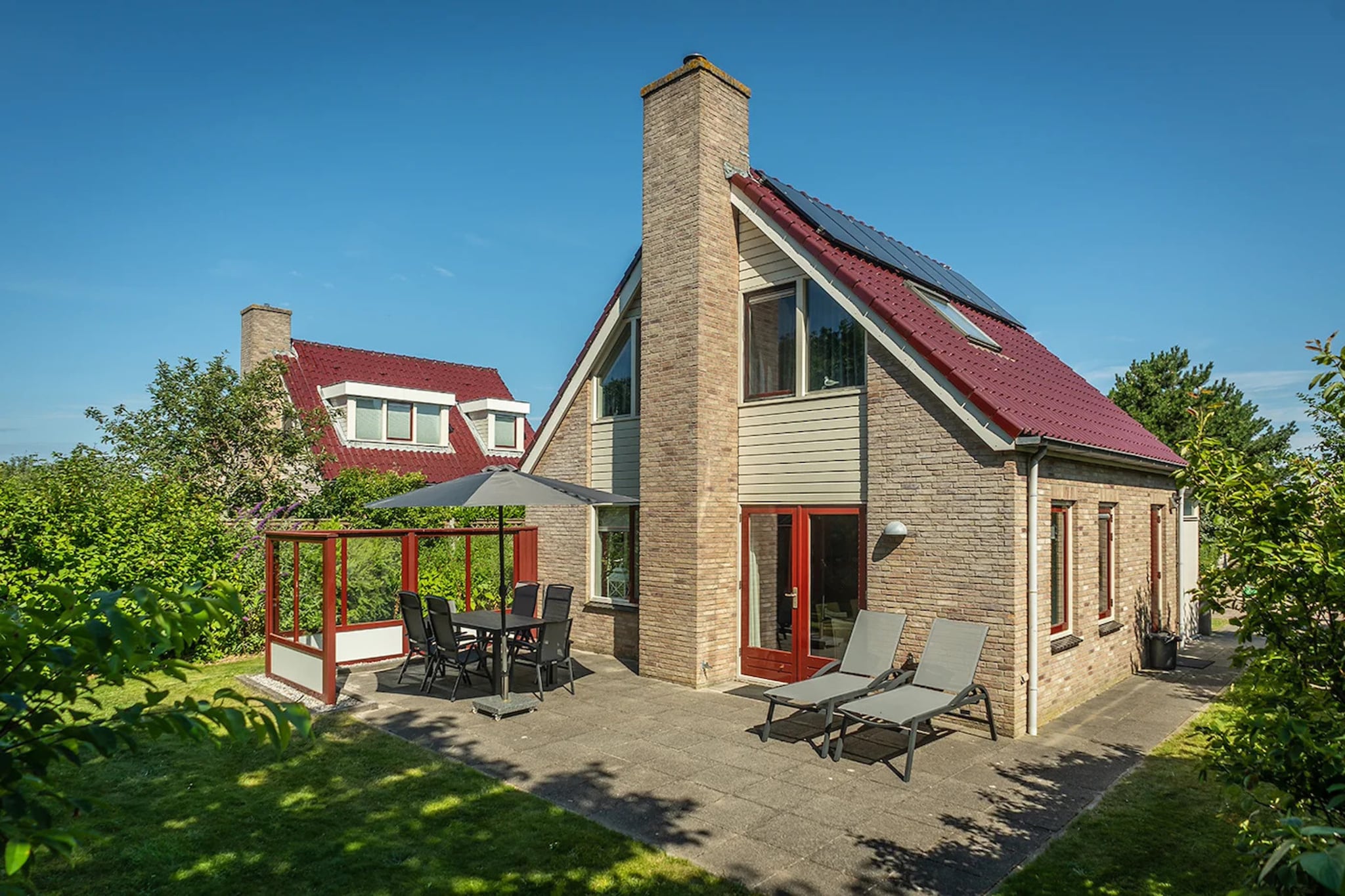 6-person luxury villa with 2 bathrooms on Texel - Terrasbalkon
