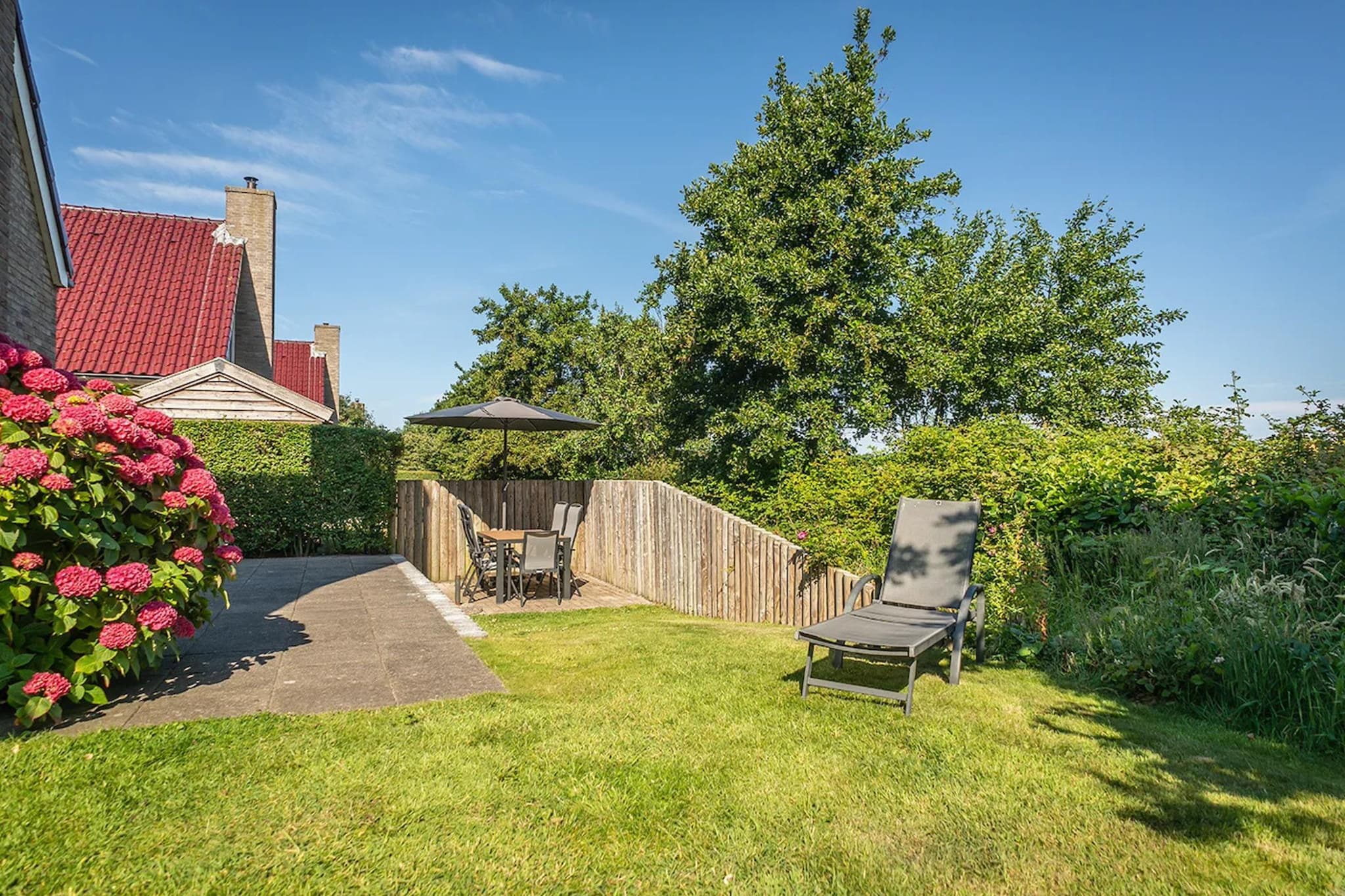 6-person luxury villa with 2 bathrooms on Texel - Terrasbalkon