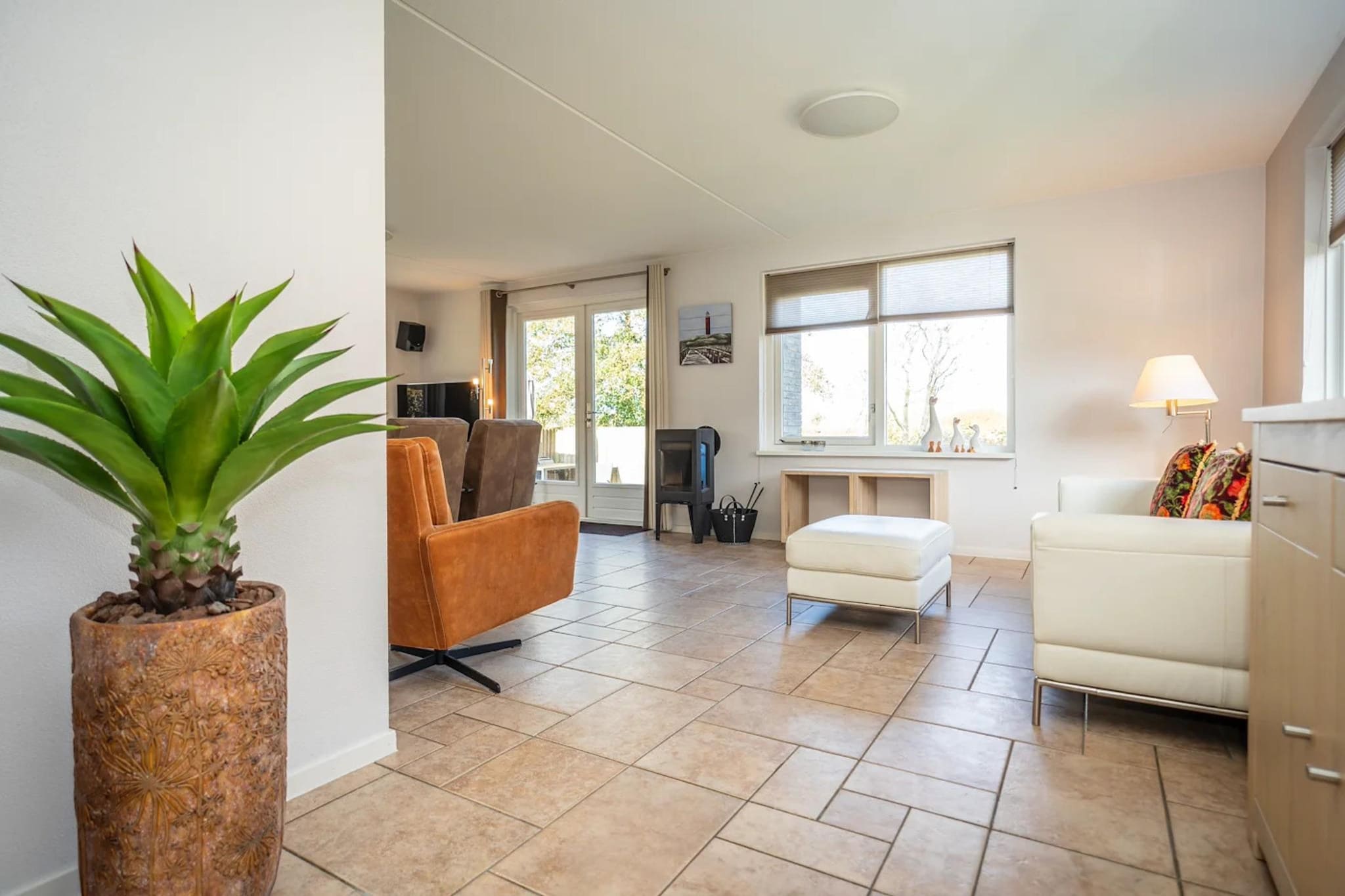 Luxury 4-person villa in a nature reserve on Texel - Woonkamer