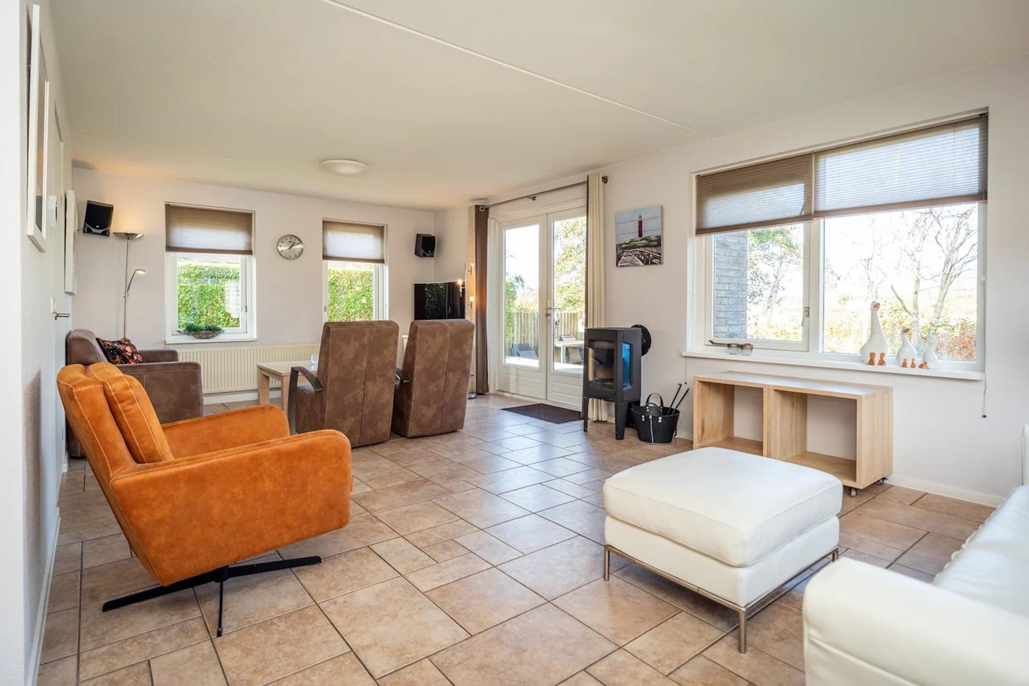 Luxury 4-person villa in a nature reserve on Texel - Woonkamer