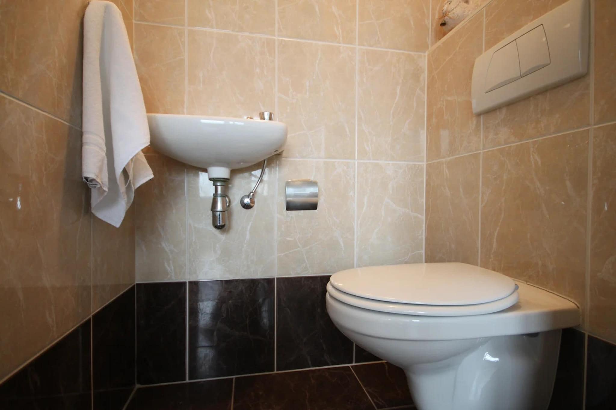 Luxury 4-person villa in a nature reserve on Texel - Badkamer