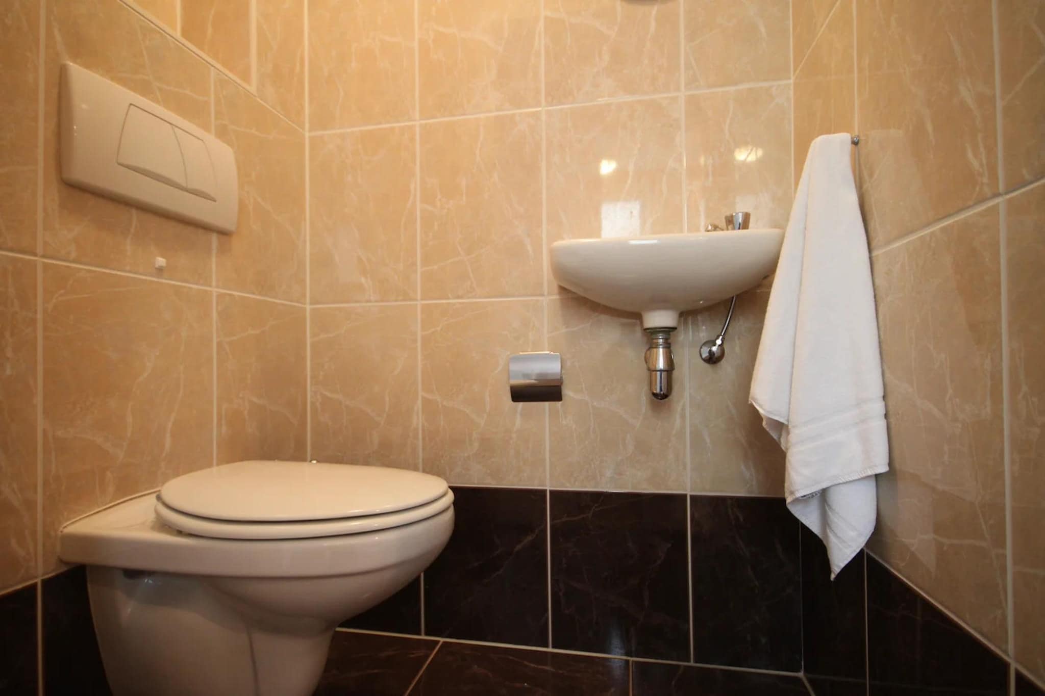 Luxury 4-person villa in a nature reserve on Texel - Badkamer