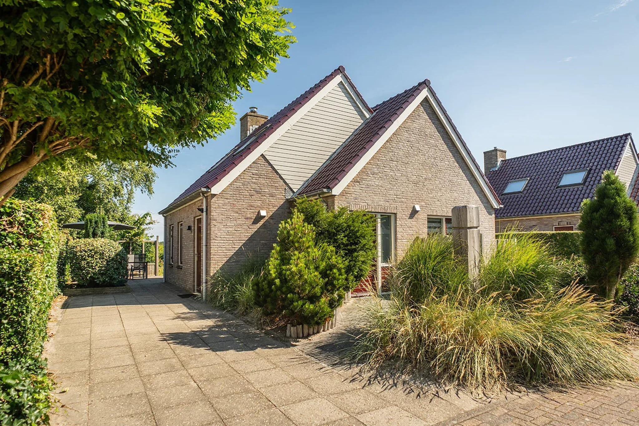 5-person luxury holiday villa on Texel - Buitenkant zomer