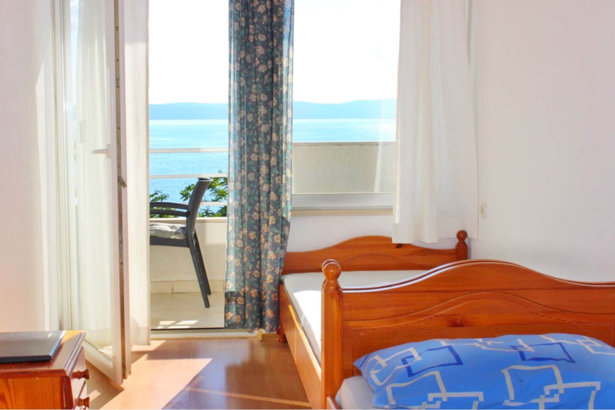 Villa Maslina-Olive two bedroom apartment with balcony and sea view Igraine