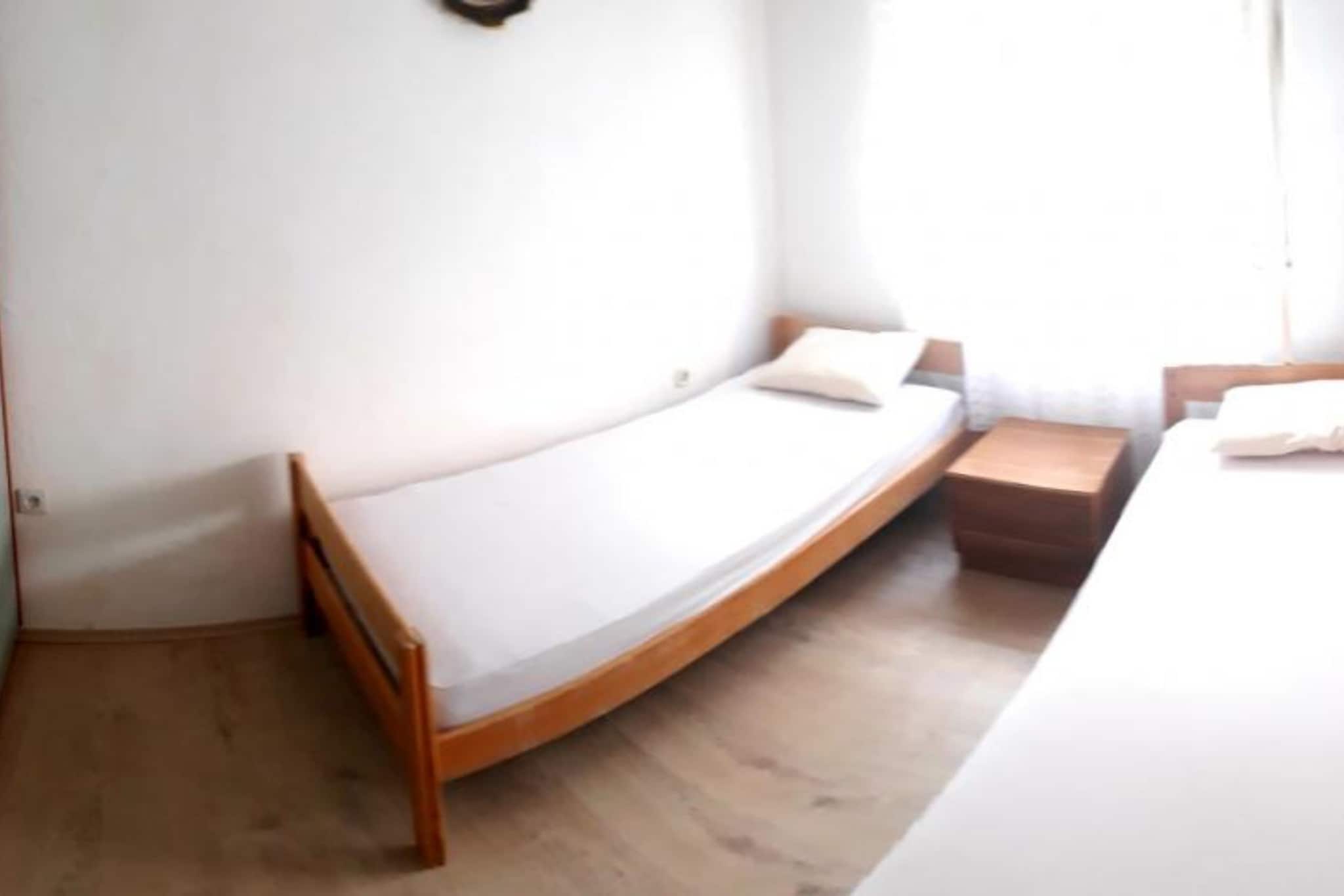 Guest House Jurković- Four Bedroom Apartment with  Sea View and Terrace - Chambre