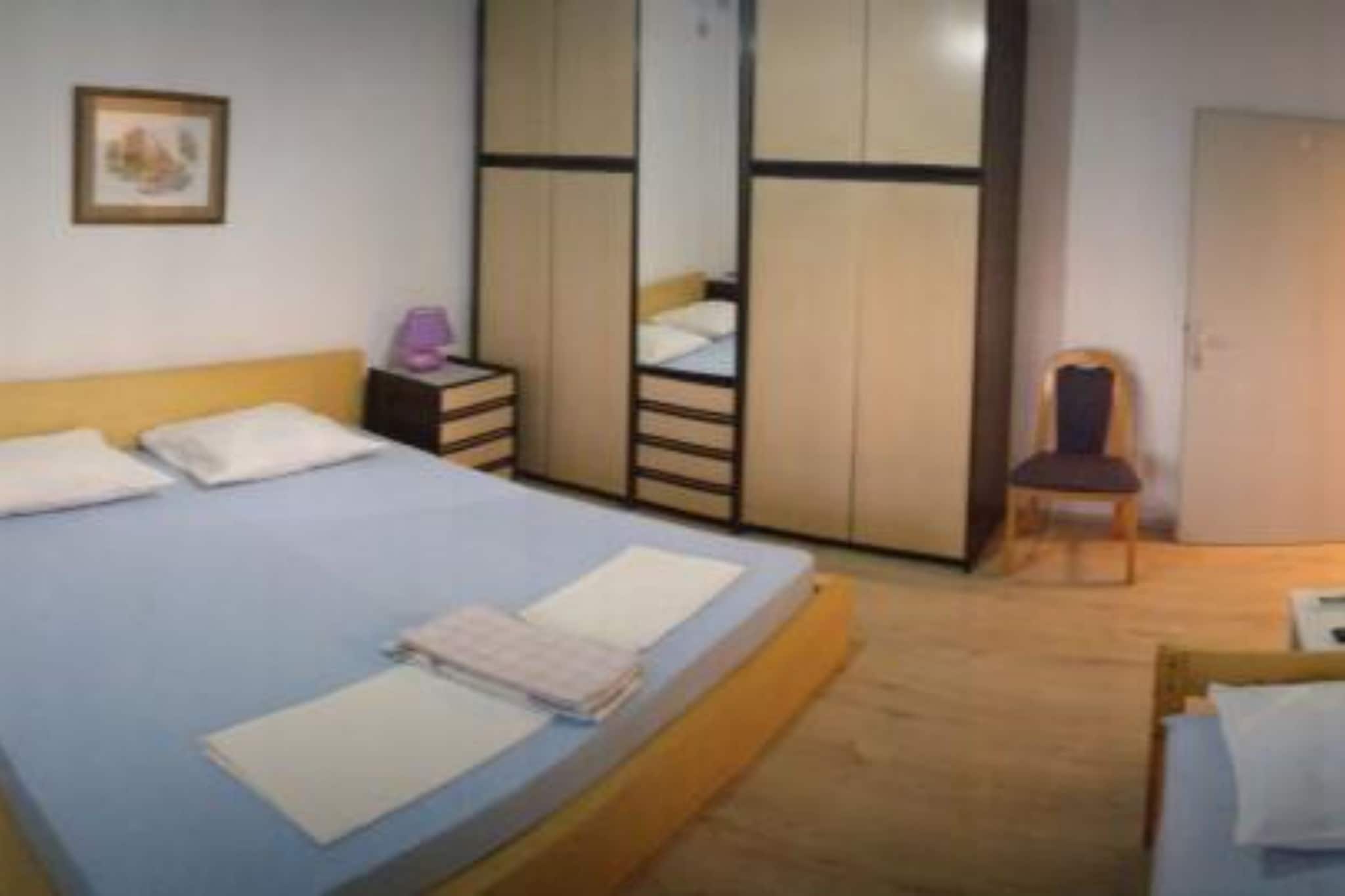 Guest House Jurković- Four Bedroom Apartment with  Sea View and Terrace - Chambre
