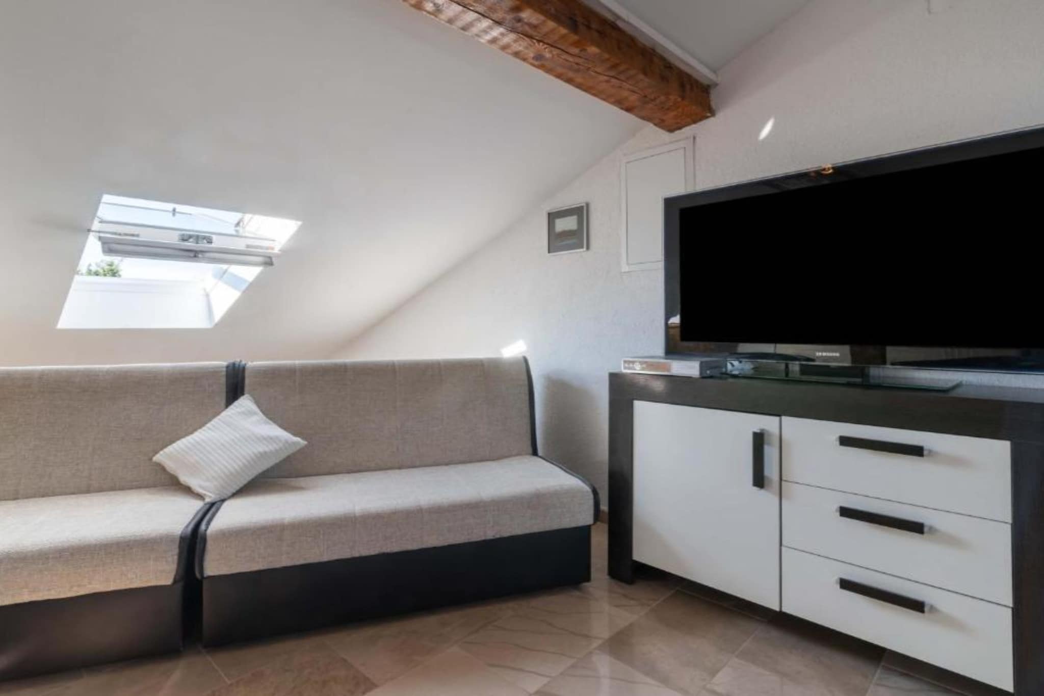 Kokolo Beach Apartments - Studio apartment (Roof) - Woonkamer