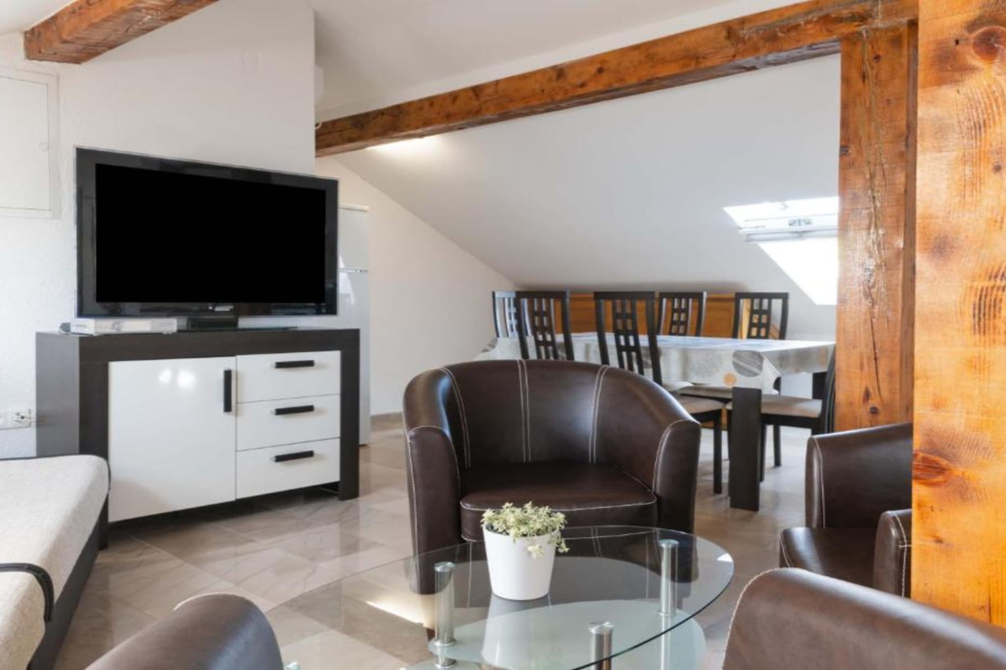 Kokolo Beach Apartments - Studio apartment (Roof) - Woonkamer