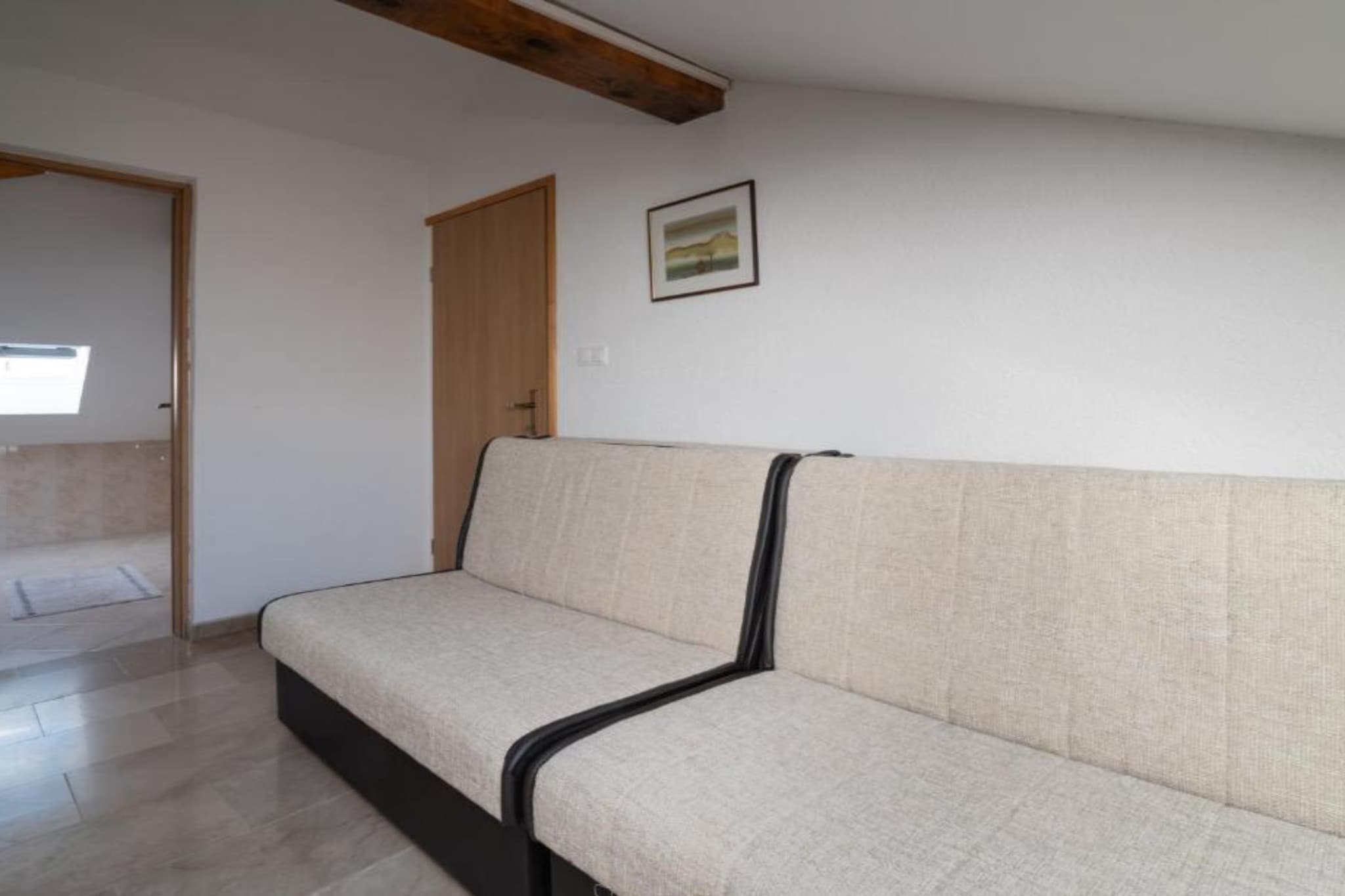 Kokolo Beach Apartments - Studio apartment (Roof) - Woonkamer