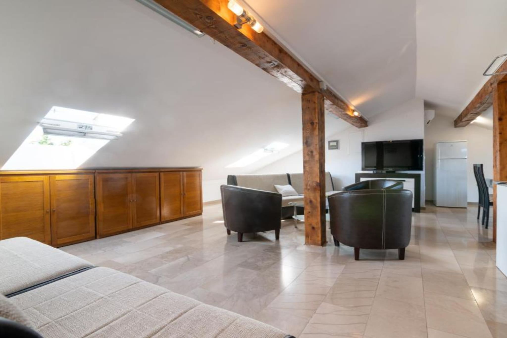 Kokolo Beach Apartments - Studio apartment (Roof) - Woonkamer