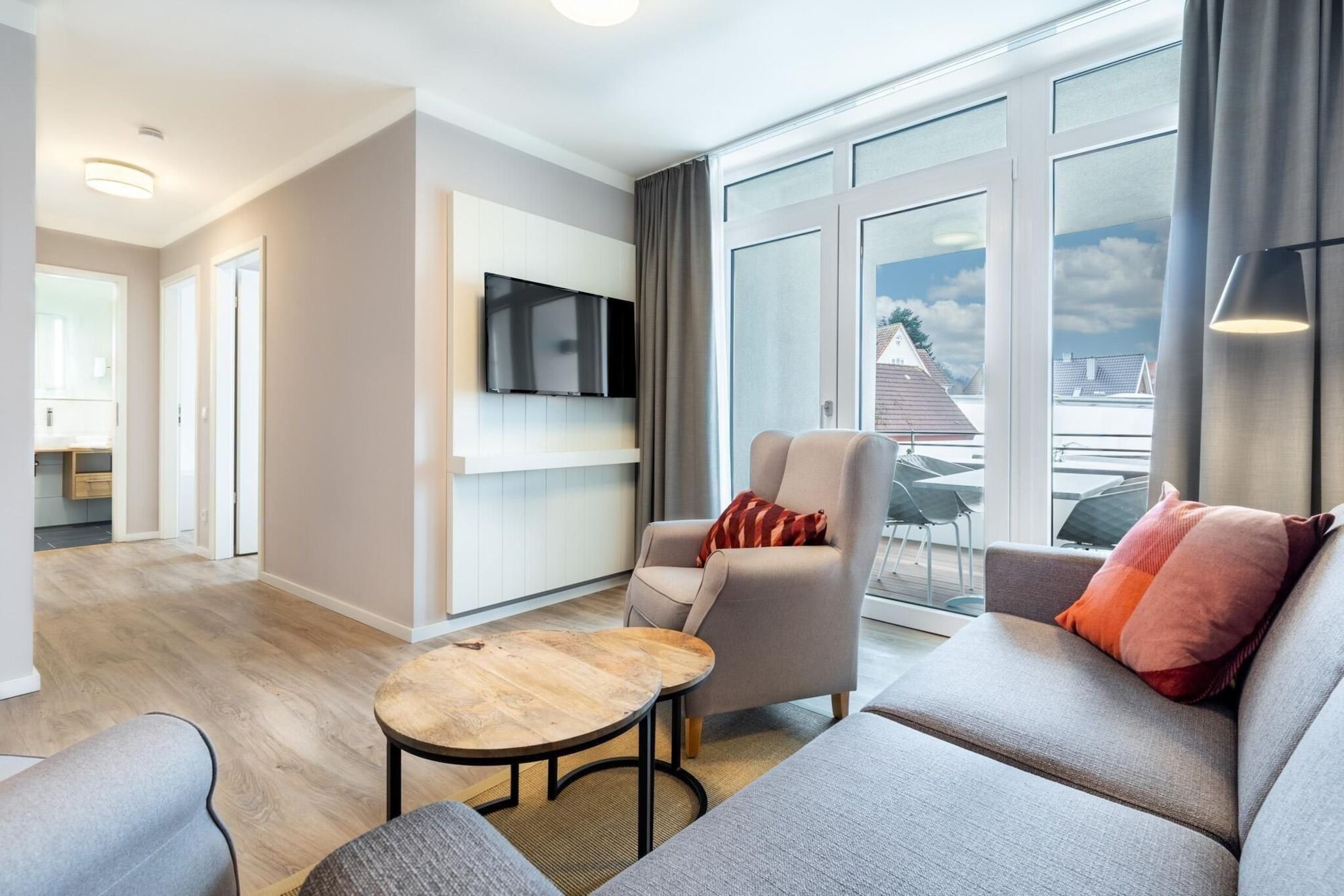 Godewindpark Travemünde Deluxe-Suite 1.17 mit West-Loggia - Woonkamer
