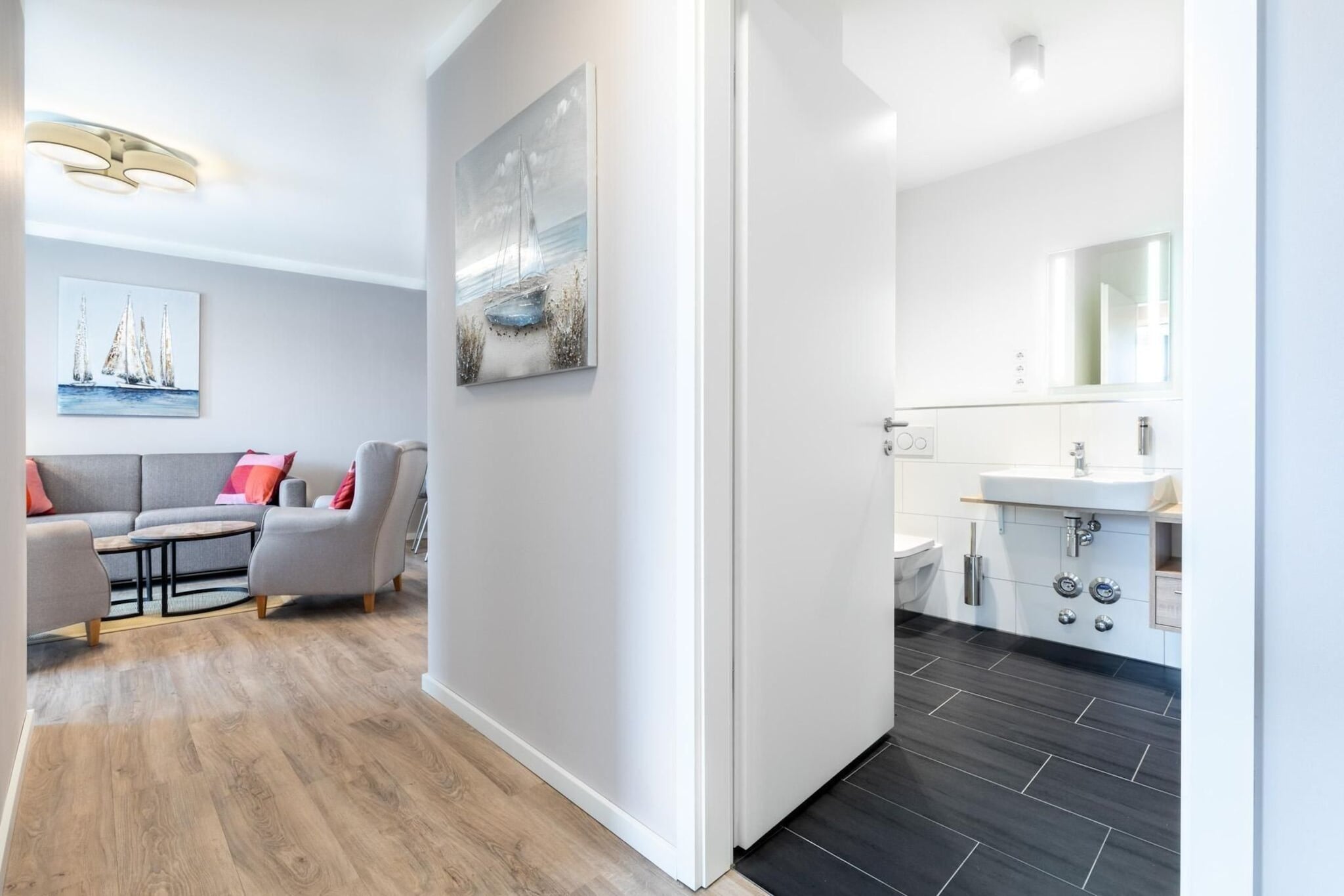 Godewindpark Travemünde Deluxe-Suite 1.17 mit West-Loggia - Woonkamer