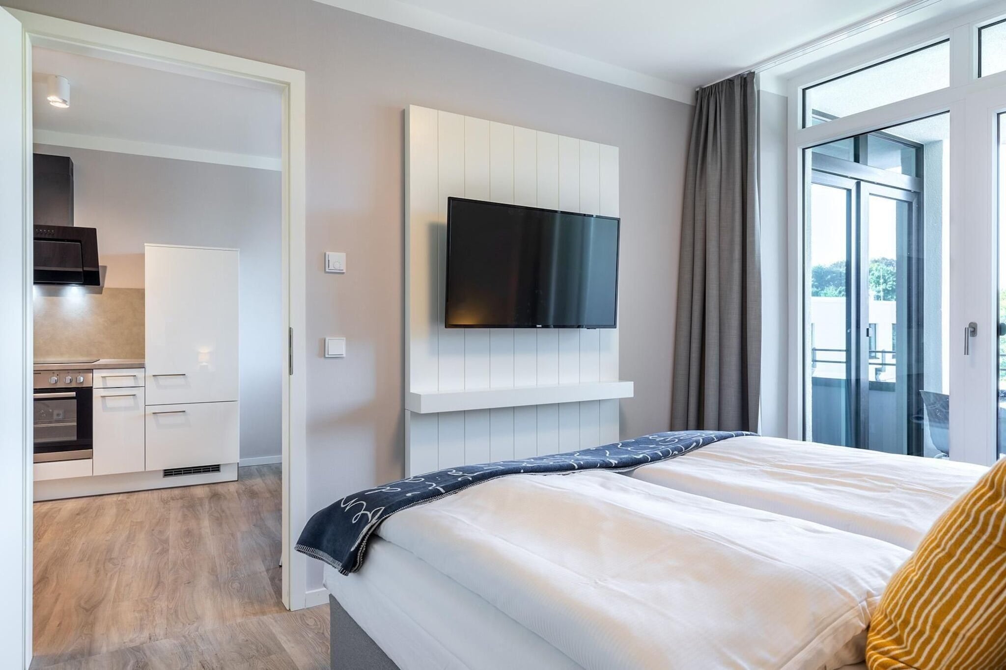 Godewindpark Travemünde Deluxe-Apartment 2.12 mit eigener e-Ladesäule in der Tiefgarage und XL-Strandkorb am Strand - Slaapkamer