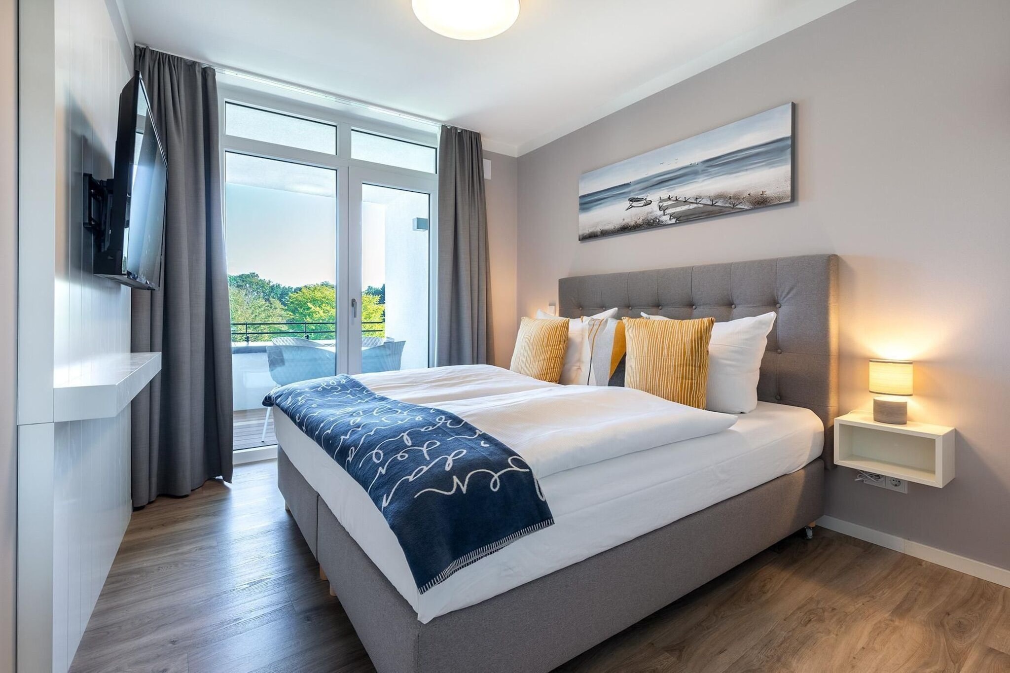 Godewindpark Travemünde Deluxe-Apartment 2.12 mit eigener e-Ladesäule in der Tiefgarage und XL-Strandkorb am Strand - Slaapkamer