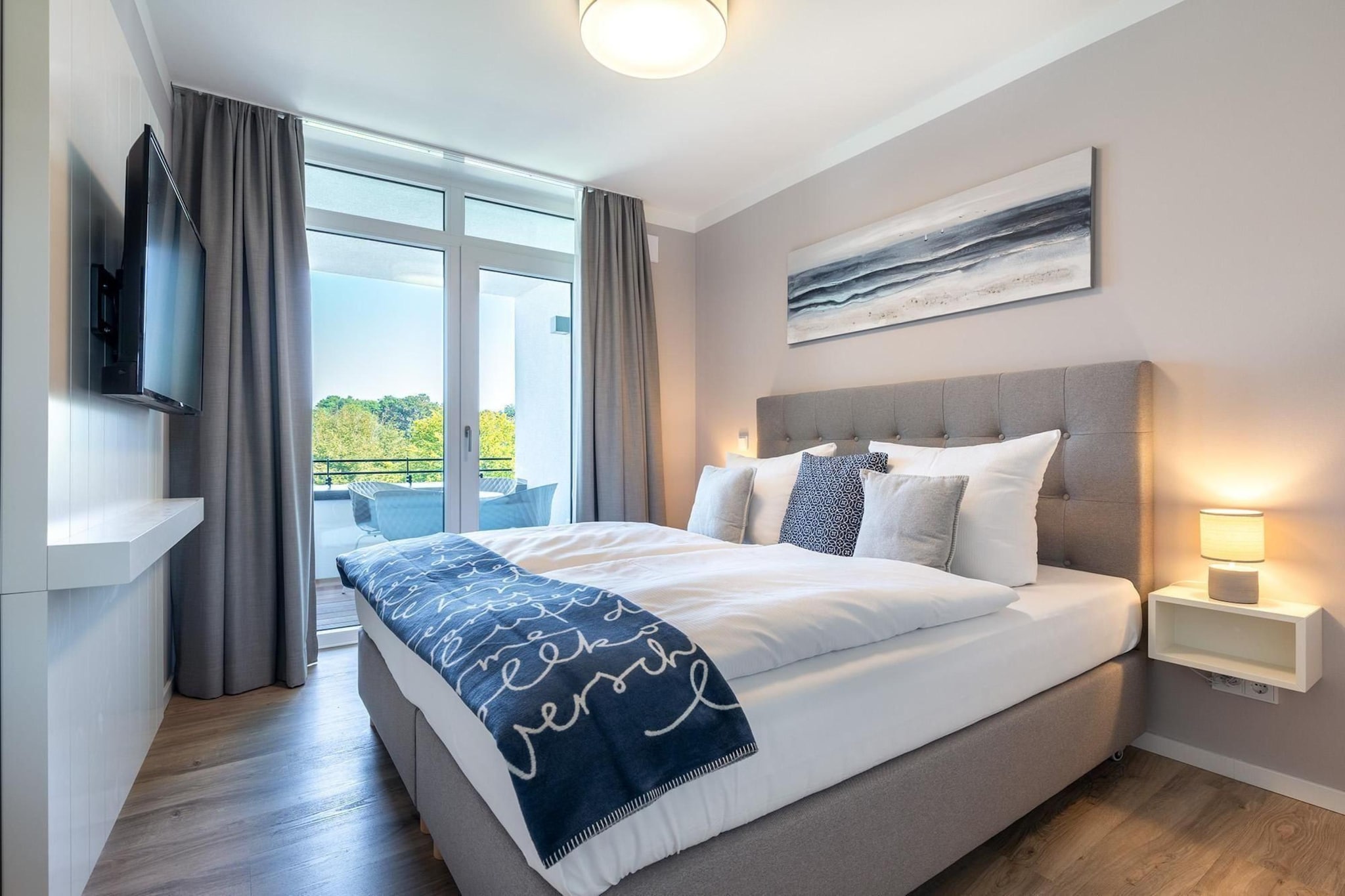 Godewindpark Travemünde Deluxe-Apartment 2.14 mit eigener e-Ladesäule, XL-Strandkorb und Hundefreundlich - Slaapkamer