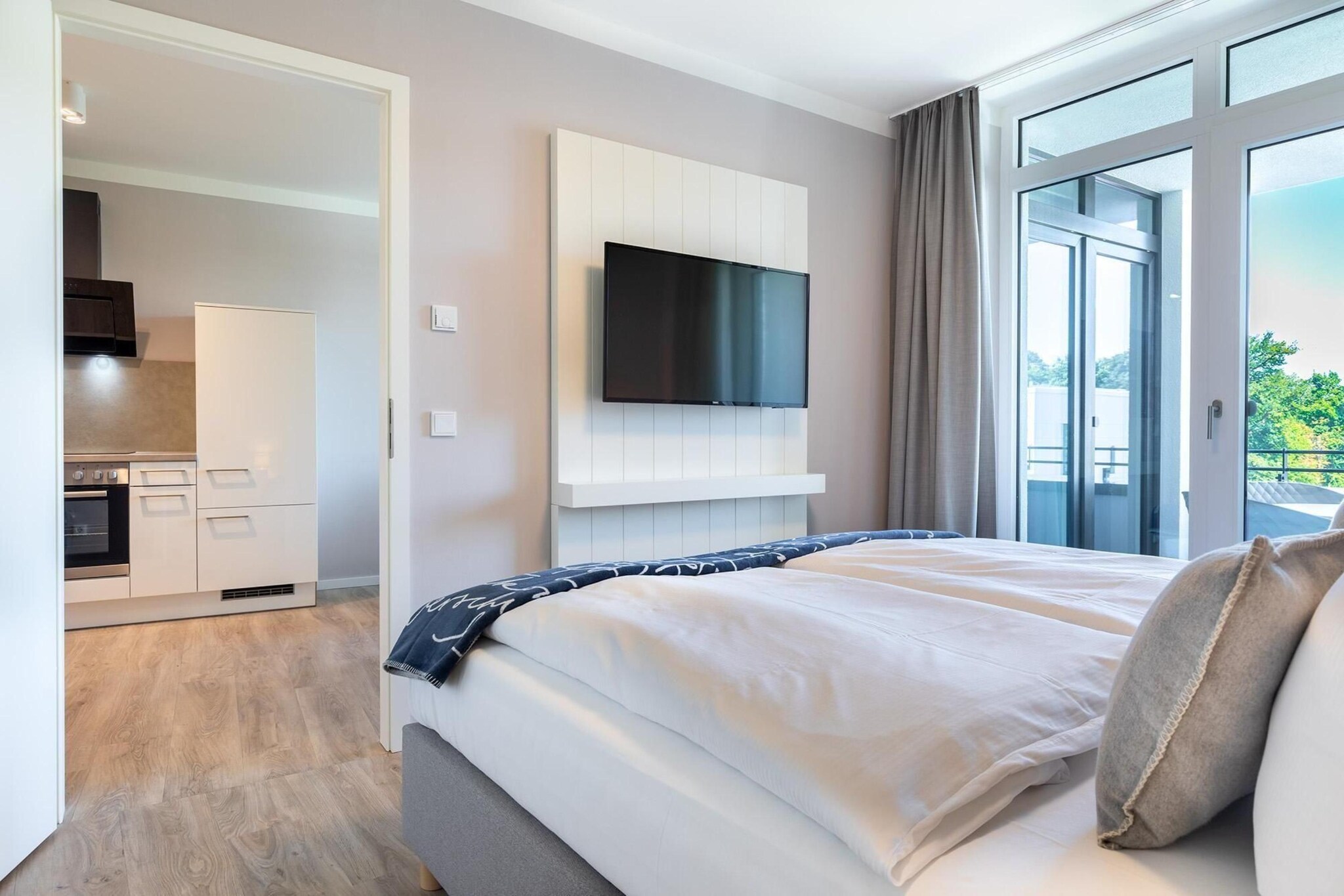 Godewindpark Travemünde Deluxe-Apartment 2.14 mit eigener e-Ladesäule, XL-Strandkorb und Hundefreundlich - Slaapkamer