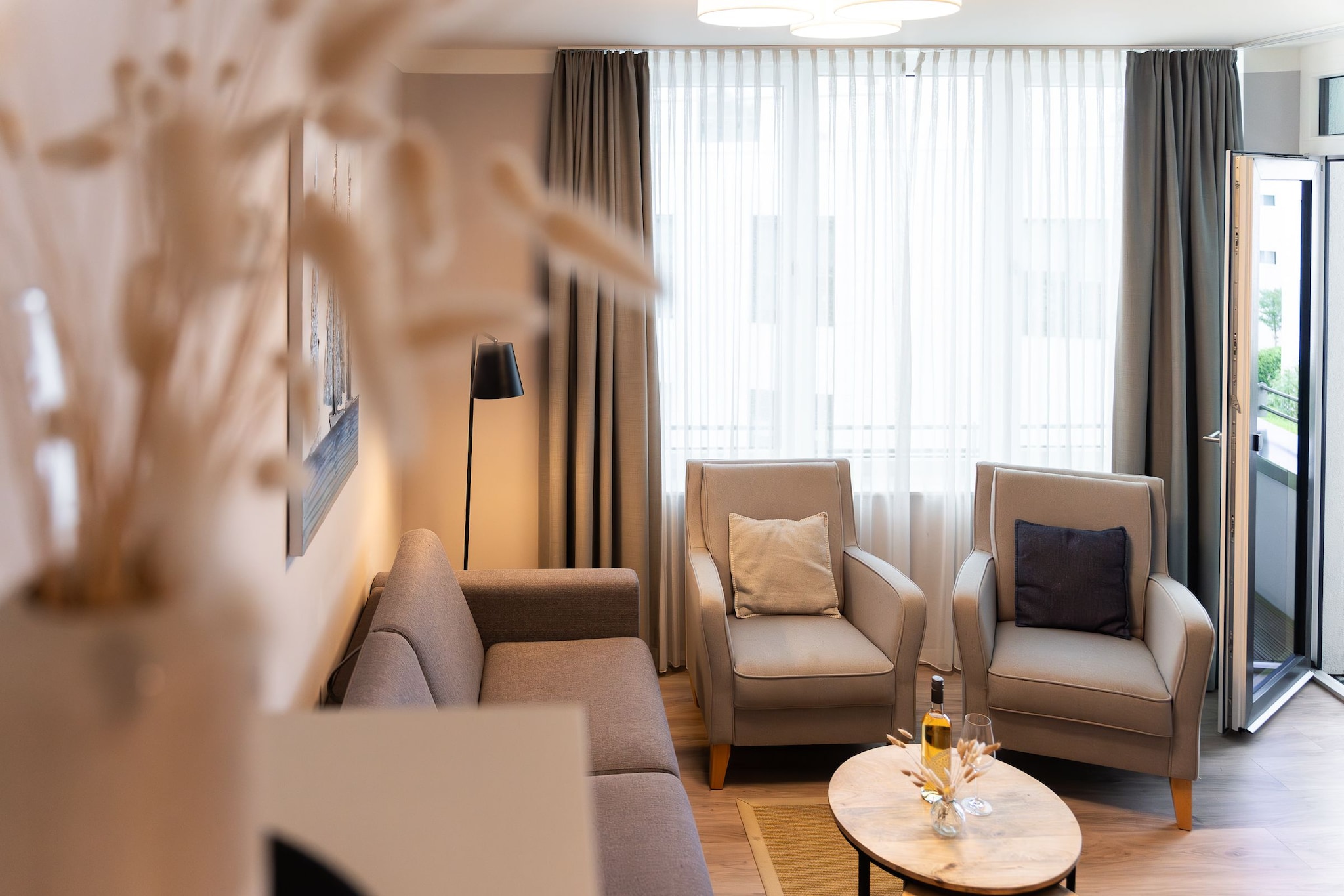 Godewindpark Travemünde Exklusives Apartment 3.11 mit Strandkorb, Begrüßungsgetränken und hundefreundlich - Woonkamer