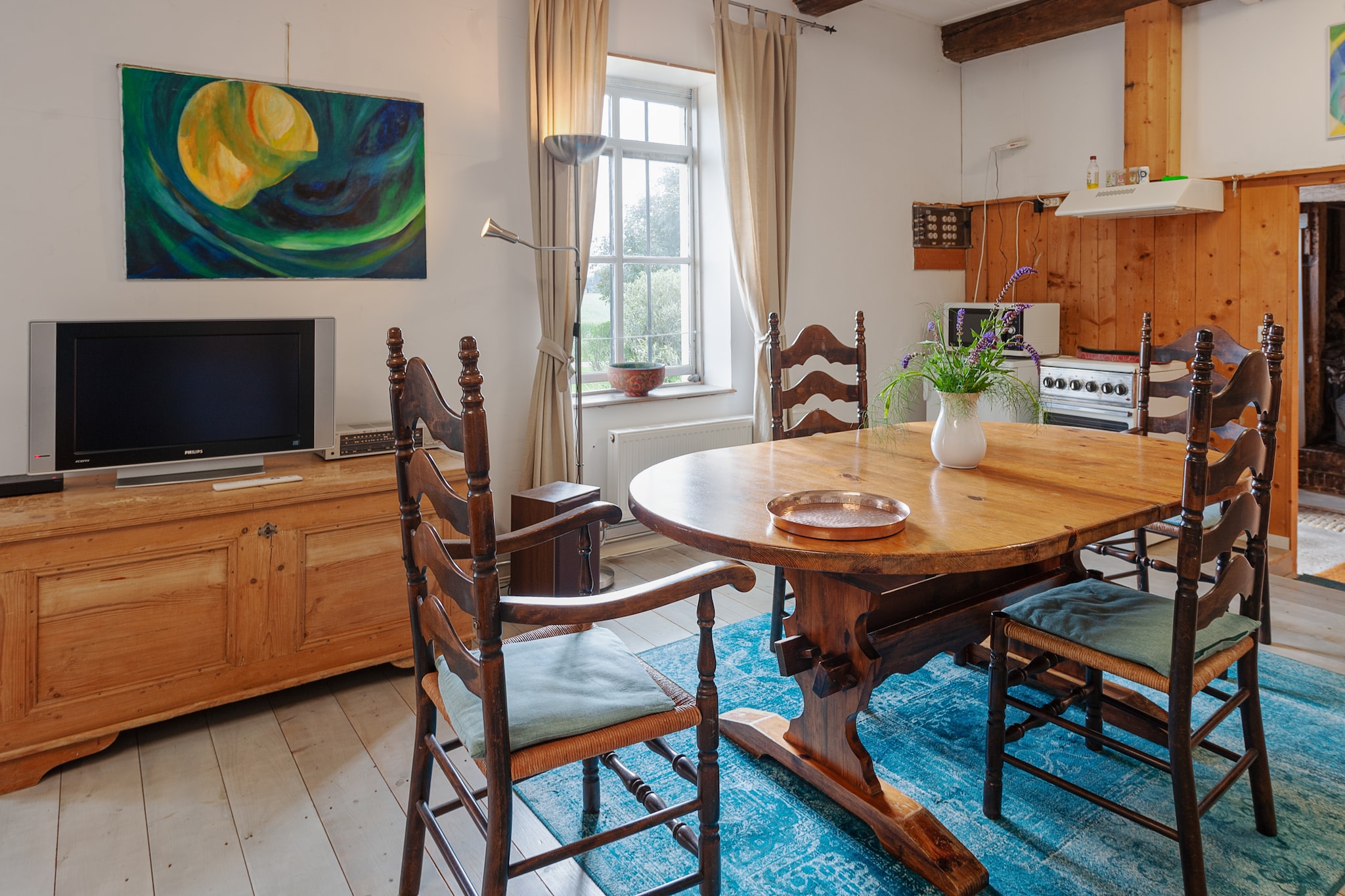 Farmhouse by Lauwers River with Rowing Boat