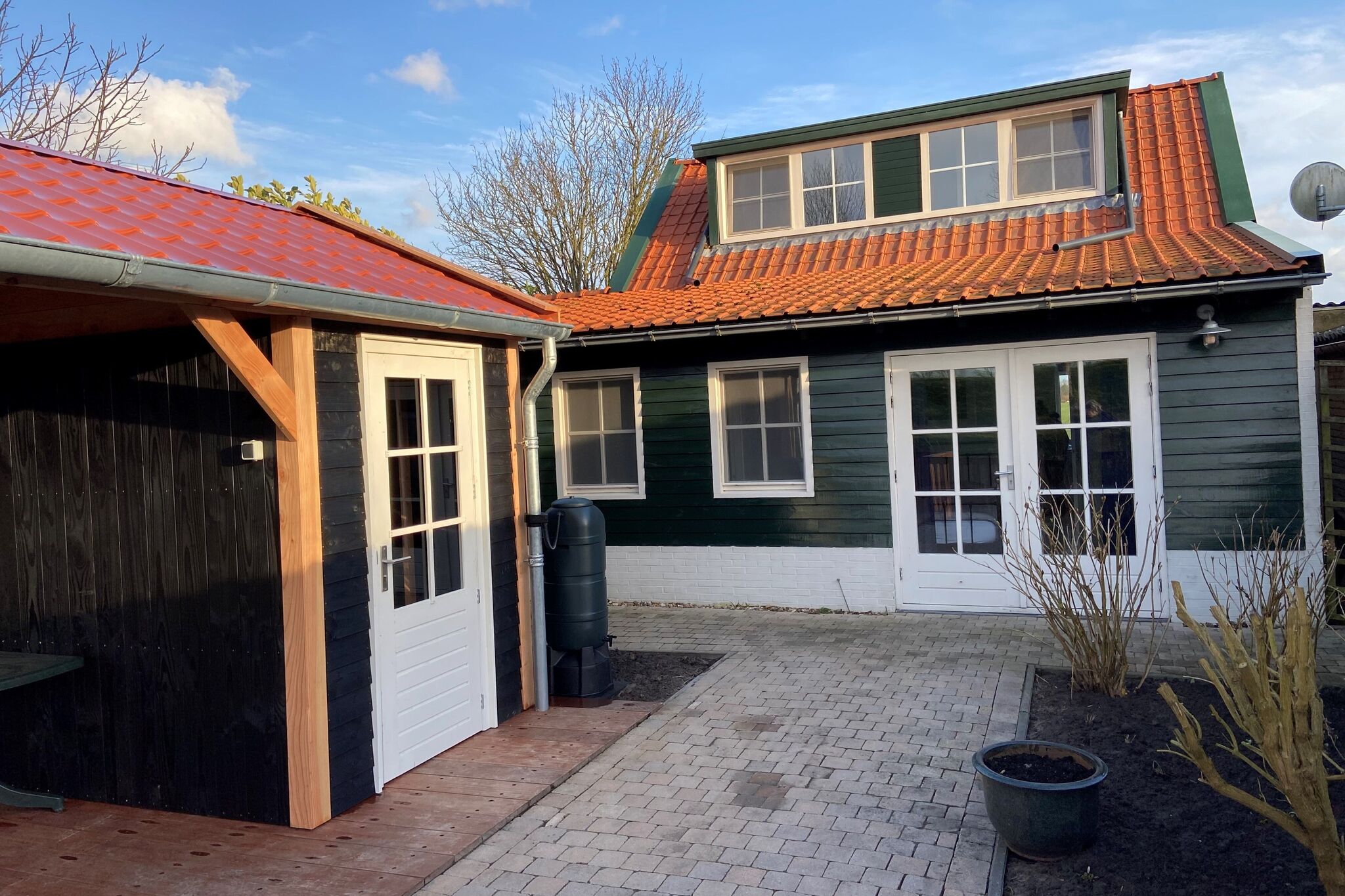 Maison de vacances confortable à Schoondijke avec une terrasse