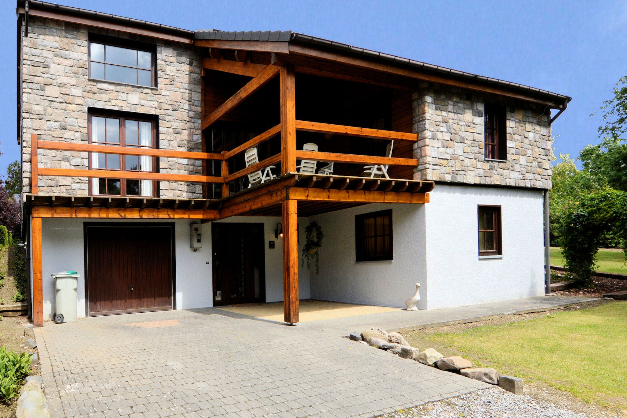 Ground floor: (hallway(toilet), bedroom(double bed or 2 single beds), recreation room(table football, billiards), relaxation area(reachable from the outside)(tumble dryer, shower, sauna, washbasin), garage(freezer))\n\nOn the 1st floor: (Living room(stereo unit), Kitchen(cooker(5 ring stoves, ceramic), coffee machine(filter), oven, combination microwave, dishwasher, fridge-freezer), bedroom(double bed), bedroom(double bed or 2 single beds, children\'s bed), bedroom(double bed or 2 single beds), bathroom(bathtub with shower, 2x washbasin), toilet(toilet))\n\nOn the 2nd floor: (Sitting room(TV(satellite), DVD player), bedroom(double bed or 2 single beds, double bed or 2 single beds), bathroom(bathtub with shower, washbasin), toilet(toilet))\n\nheating(central), terrace(roofed), terrace, garden, garden furniture, BBQ, play equipment, high chair, playpen, Charging post for electric cars, Charging post for electric cars