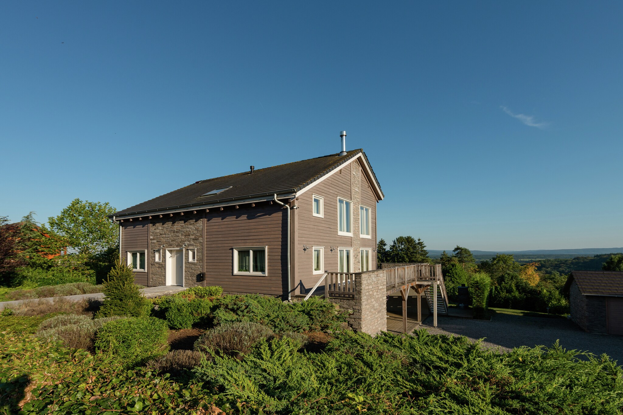 An optional utilities and service fee of EUR 225,00 will be charged before your arrival. Details are given below.<br> Due to COVID-19, only bookings with a maximum of 15 people will be accepted._x000D_
_x000D_
Located in Septon this villa has 8 bedrooms and can house 18 people. The Durbuy region of Belgium has a gorgeous view of the hilly Ardennes landscape._x000D_
_x000D_
The forest is only 100 m away, where you can go for walks and hikes. Restaurants are 3 km away and the lake is at a distance of 5 km. For golf enthusiasts, there are 2 golf courses within a few km._x000D_
_x000D_
Ideal accommodation for large families. The relaxation area has 2 showers, bubble bath and a sauna. It has multiple sunny terraces with views, 7 out of the 8 bedrooms have their own toilet, shower and bath._x000D_
_x000D_
If you are in search of nightlife then it is only 5 km and so are the lake and town center. There is an indoor swimming pool 8 km away and the public transport is at a distance of 6 km. The Liege Airport is 58 km and is the nearest airport to Durbuy. <br><b> Optional Utilities & Service Package </b><br><b> An optional utilities and service package of EUR 225,00 </b> can be selected prior to your arrival. You will receive a separate communication with the payment link should you wish to include it.<br>This package ensures a seamless stay and conveniently covers services such as final cleaning, utility consumption, service support, and protection against minor damages or incidental costs during your stay.<br>Guests who prefer may manage these services independently, provided the property is returned in good order at check-out.