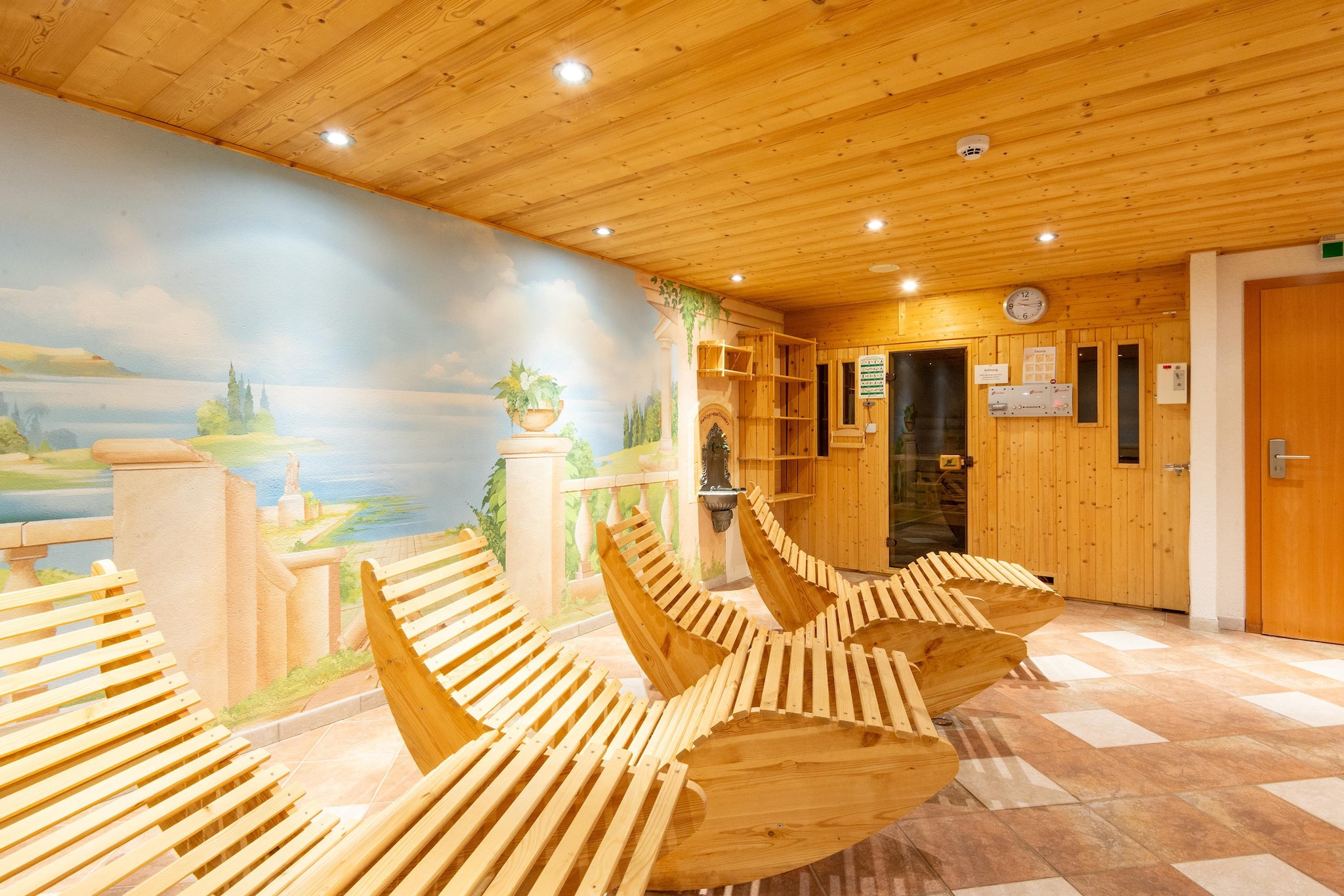 Ground floor: (relaxation area(shared entrance)(shower, solarium, sauna(paid)))\n\nOn the 1st floor: (Large kitchen(TV(cable), oven, microwave, fridge-freezer, balcony), bedroom(single bed, double bed), bedroom(single bed, double bed), bathroom(shower), bathroom(washbasin, toilet))\n\nBasement: (ski storage(shared entrance)(washbasin, ski boot heaters))\n\ncoffee machine, washing machine(paid), heating(central), garden(shared with other guests), garden furniture, BBQ, 2x parking, table tennis table, children\'s bed(on request), high chair