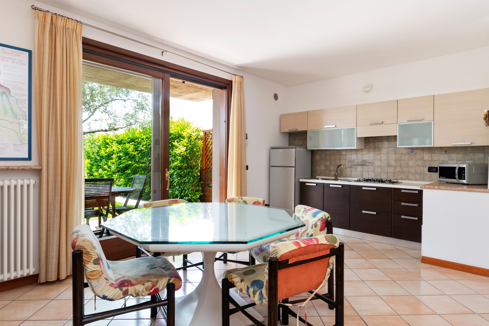 Ground floor: (open kitchen, Living/diningroom, bedroom(double bed), bathroom(shower, washbasin, toilet, bidet))\n\nBasement: (bedroom(3x single bed), bedroom(2x single bed), bathroom(shower, washbasin, toilet, bidet))\n\ngarage, garage, TV, microwave, shower, washing machine, heating, heating, air conditioning, air conditioning, terrace(fire place), garden(private, fenced), garden furniture, garden furniture, BBQ, swimming pool(shared with other guests, 18 x  8 m., opened from 1/2 May upto and including 1/2 Sep)