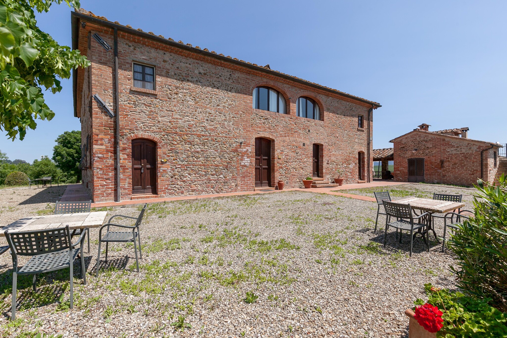 Nestled amidst rolling green hills, this inviting apartment in Fabbrica offers the perfect blend of rustic character and comfort. The open kitchen and living area create a cozy space for unwinding, while the mezzanine with additional beds adds a touch of charm. Outside, a well-kept garden with a BBQ corner is ideal for leisurely afternoons, and the shared swimming pool is perfect for a refreshing dip under the Tuscan sun. A children's bed is available on request, making this a family-friendly retreat.

Just 9 km away lies the enchanting village of Peccioliâ€”brimming with artisan shops and medieval character. The apartment is an ideal base for exploring Tuscanyâ€™s iconic destinations, including Pisaâ€™s Leaning Tower, the artistic heart of Florence, and the dramatic skyline of San Gimignano. Volterraâ€™s Etruscan charm and Sienaâ€™s Gothic beauty are also within reach. For outdoor lovers, scenic cycling trails wind through cypress-lined roads, and the beaches of the Tyrrhenian coast are just a short drive away.

Tuscan traditions come alive hereâ€”not just in scenery, but on the plate. Every Monday, guests can enjoy an authentic Tuscan dinner on-site, and Thursdays are reserved for wood-fired pizza nights. Local wineries offer tastings by request, allowing you to sample Chianti and other regional wines. In Peccioli, try "La Vecchia Carraia" for hearty local fare or "Pasticceria Ferretti" for unforgettable desserts. Simple, flavorful, and rooted in traditionâ€”this is Tuscany at its tastiest.