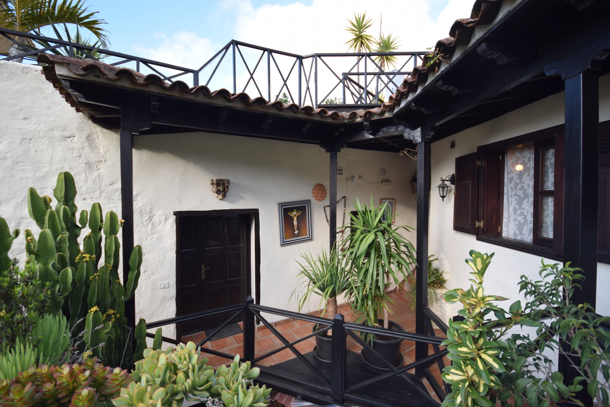 Apartamentos Monasterio de San Antonio 4 - Buitenkant zomer