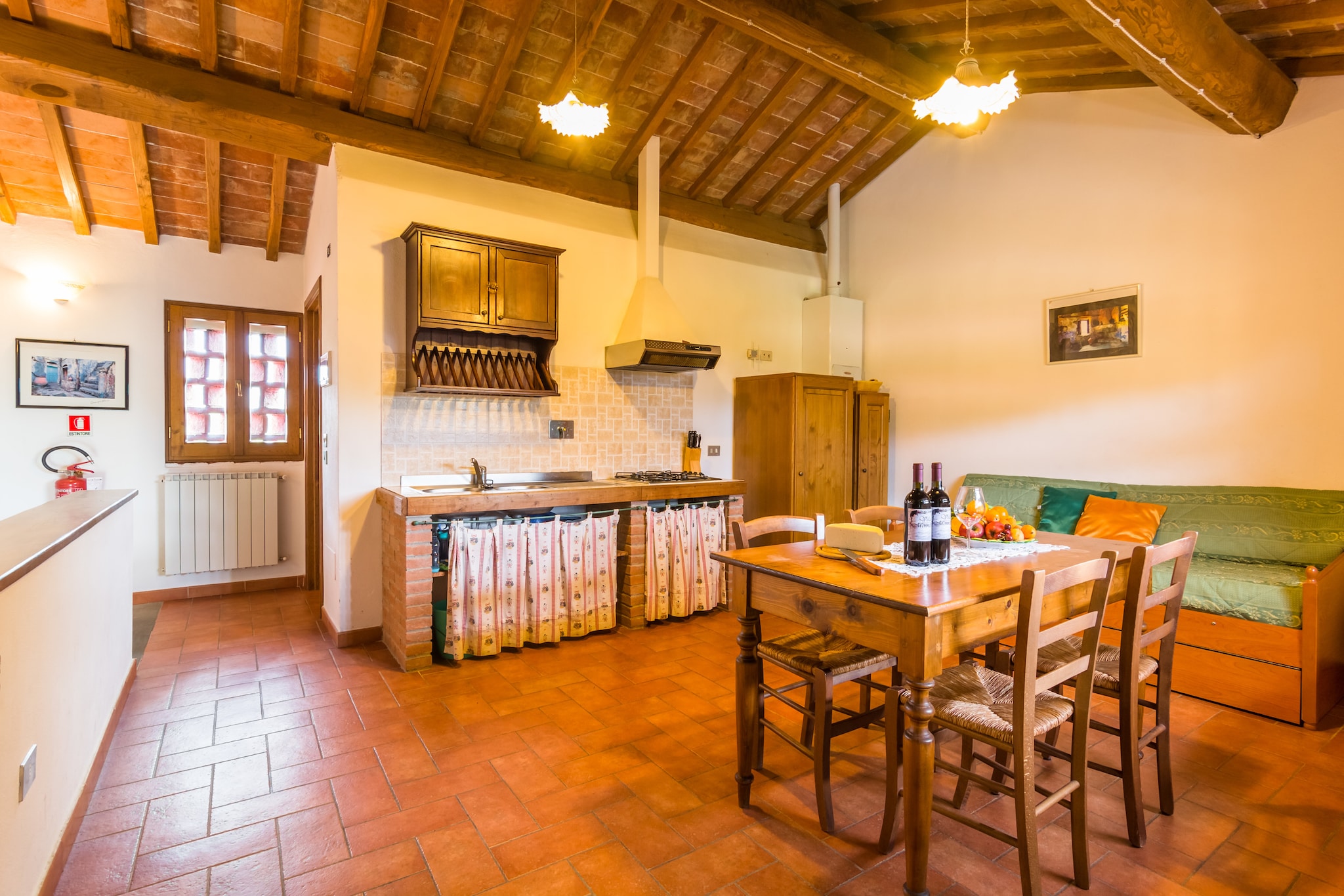 On the 1st floor: (open kitchen(hob, washbasin), Living/diningroom(double sofa bed, TV(satellite)), bedroom(bunk bed), bedroom(double bed), bathroom(shower, washbasin, toilet, bidet))\n\nheating, garden(shared with other guests), garden furniture, BBQ, parking, swimming pool(shared with other guests, opened from May upto and including Sep), play equipment, table tennis table