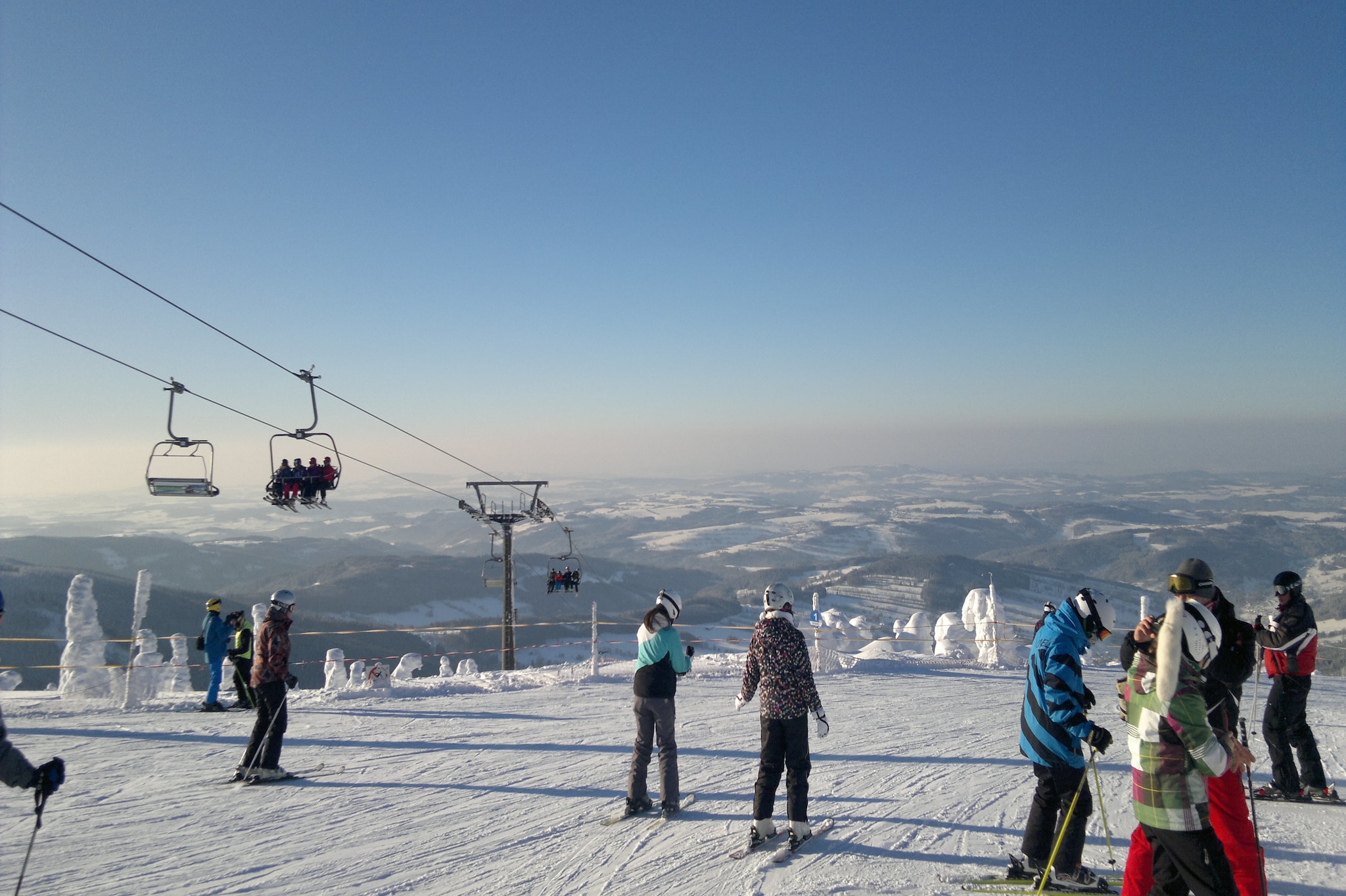 Mountain Town Escape
Set in the peaceful surroundings of Rokytnice nad Jizerou, this modern 1-bedroom apartment offers a welcoming stay for families and small groups. With space for up to five guests, it combines comfort with style, featuring a fully equipped kitchen, warm interiors, and large windows that open to views of the nearby slopes. The home’s thoughtful design makes it a cozy retreat after a day of outdoor activities.
Active Days Nearby
Just 100 meters from both the forest and ski lifts, the location is ideal for winter sports enthusiasts and summer adventurers alike. Whether you’re skiing the slopes of the Giant Mountains, exploring hiking and cycling trails, or enjoying the crisp mountain air, the apartment serves as a convenient base. Public transport is only 200 meters away, while the town center—just 400 meters—offers shops and services to make your stay easy and enjoyable.
Dining and Relaxation
A selection of restaurants lies only 100 meters from the apartment, giving you the chance to sample local Czech cuisine after an active day. For those who prefer to cook at home, general supplies are just 300 meters away. In the evening, unwind in the cozy living area with a movie or simply rest by the dining table with family. With on-site parking and the option of a children’s bed, this apartment provides a well-rounded stay for travelers seeking both relaxation and adventure in Rokytnice nad Jizerou.