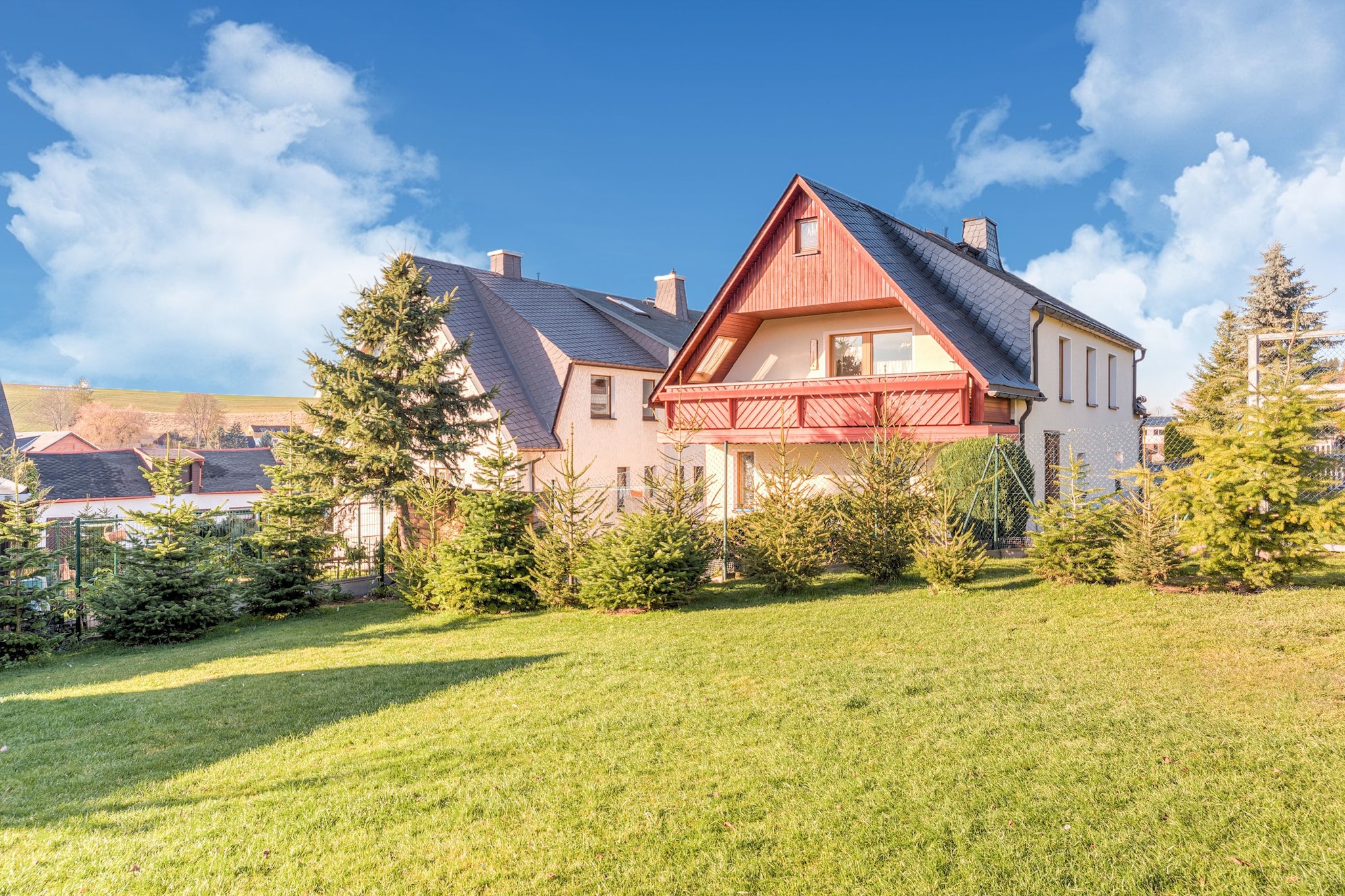 Located in the heart of the beautiful Ore Mountains Natural Park, this holiday home in Crottendorf has 2 bedrooms for 5 people. The child-friendly home has a fenced garden and terrace to enjoy relaxed vacations.
For your bread and grocery, there are shops at 300 m. The town, 1 km away can be visited if you want to enjoy a variety of cuisines. Many hiking trails run through the forest, 2 km away.
A furnished garden is there outside to relish barbecue meals. Play equipment, high chair and cot are some of the faculties available for the little munchkins. You can also enjoy a siesta on the deckchairs. Keep away your laundry worries as there is a washing machine available for you here. Parking is on-site.
