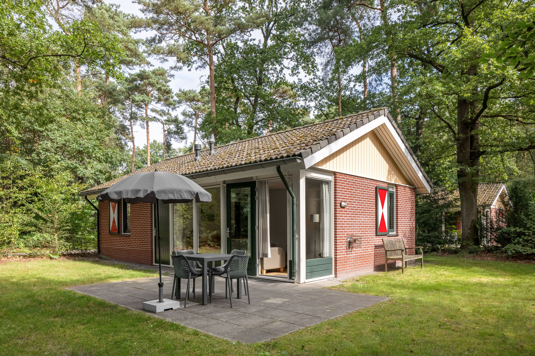 Engaging chalet with dishwasher next to a nature reserve