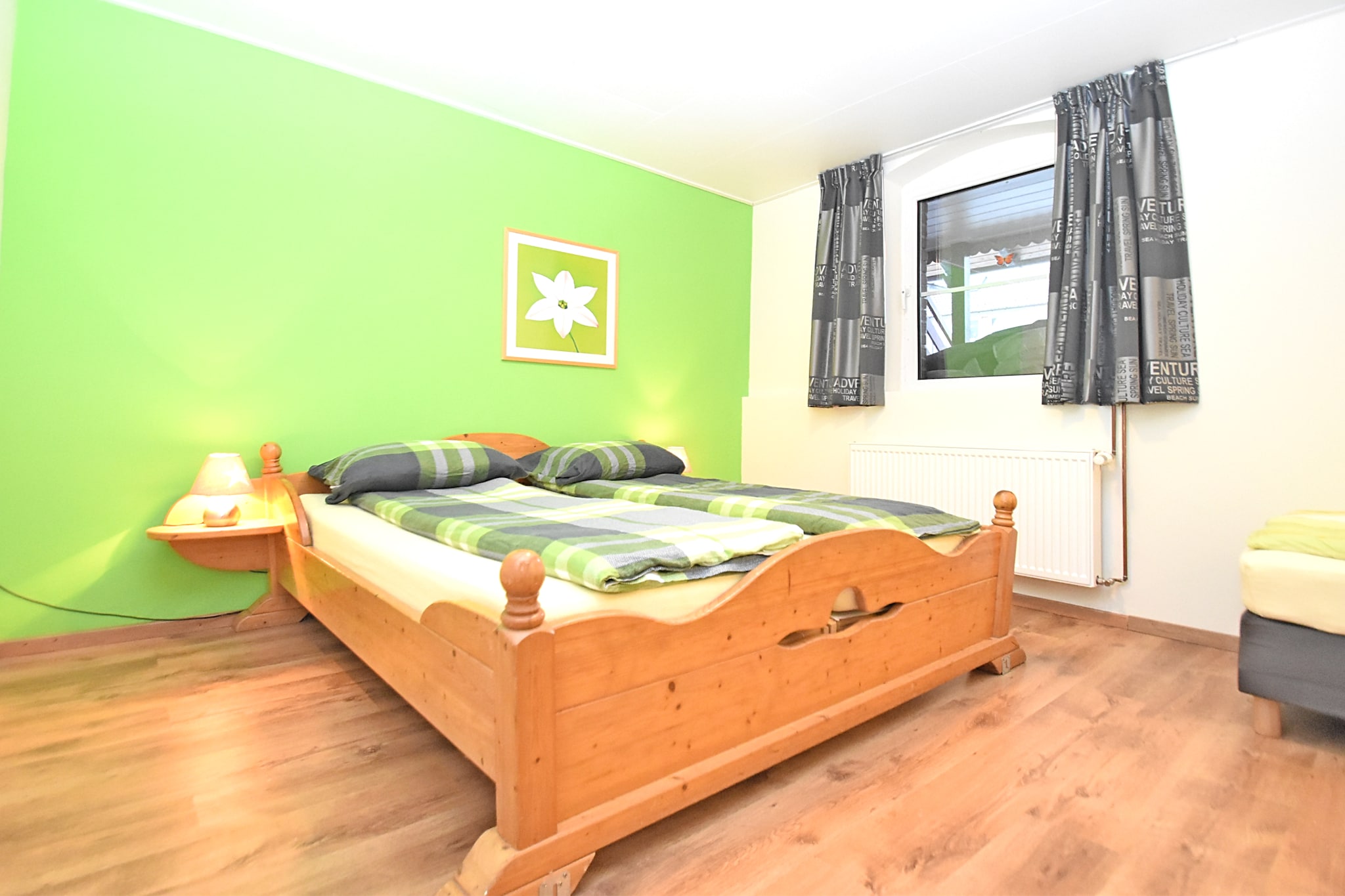 Ground floor: (Entrance, Kitchen(dining table, cooker(3 ring stoves, ceramic, electric), oven, microwave, dishwasher, fridge-freezer), open kitchen(electric kettle, toaster, cooker(ceramic), coffee machine(filter), oven, microwave, dishwasher, fridge(+ freezer), fridge-freezer), Living/diningroom(TV(flatscreen, satellite), stove, DVD player), bedroom(double bed(180 x 200 cm), bunk bed), bedroom(2x single bed, double bed), bedroom(double bed, children\'s bed), bedroom(double bed(140 x 200 cm)), bedroom(2x single bed), bathroom(bathtub with shower, washbasin, toilet), bathroom(shower, washbasin, toilet), bathroom(shower, washbasin, toilet), Landing)\n\nshared room(table football), relaxation area(shower, infrared sauna), cot, heating(central), terrace(60 m2), garden(shared with other guests, fenced, 600 m2), garden furniture, BBQ(charcoal), 10x parking, changing mat, play equipment, high chair, toys, insect screens, Sunscreen