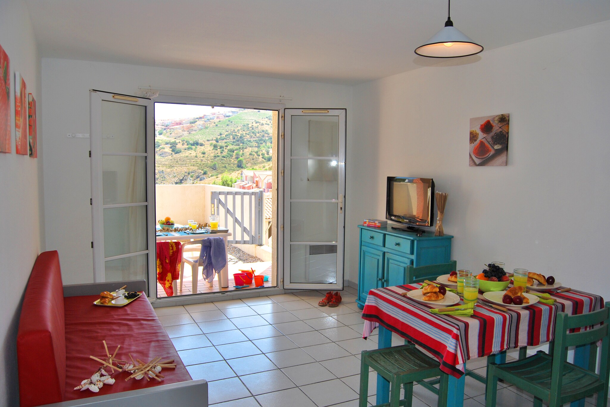Kitchenette(microwave, dishwasher), Living/diningroom(double sofa bed, TV(paid)), bedroom(double bed or 2 single beds), bedroom(bunk bed or 2 single beds), bathroom(bathtub or shower, washbasin), toilet, balcony or terrace, garden furniture, swimming pool(shared with other guests)