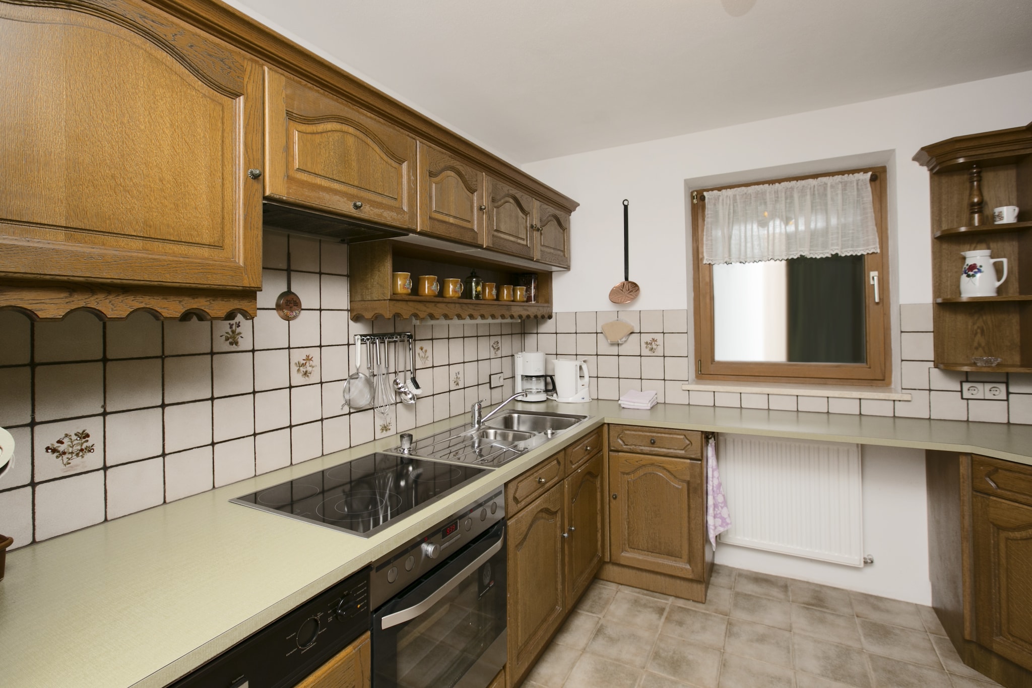 Perfect for a small family or a group of 4 friends, this 2-bedroom apartment is nestled in the hills in Hinterbichl (Wängle). On the furnished balcony, which offers great mountain views, you can spend your evenings with a refreshing cool drink.



You are close to Tiroler Zugspitzarena ski area with around 50 chair lifts and more than 100 km of skiing trails. Hop onto the ski bus that stops at 100 m to reach the ski area. Several restaurants serving local dishes are at 200 m. The town center with supermarkets and nightlife pubs is at 1 km if you wish to explore the local culture and go shopping. There is a lake at 3 km for a pleasant day out.



Central heating keeps you comfortable indoors. The living room has a TV and a stereo unit for entertainment. You can try out new recipes and cook hearty meals in the large equipped kitchen. Parking is available.