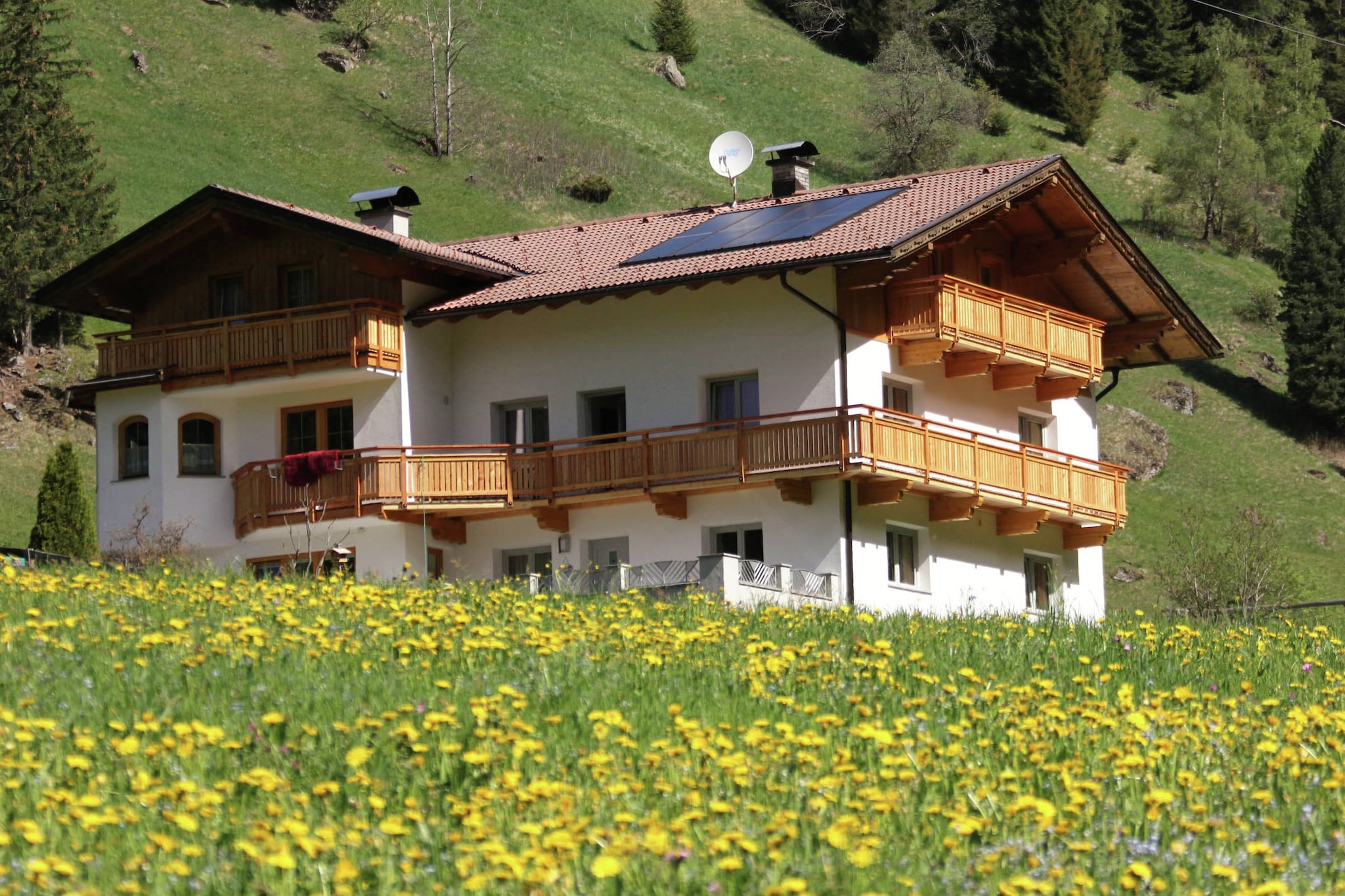 Located in Außervillgraten, this apartment with 4 bedrooms is ideal for two families or small group of 6. The property offers magnificent mountain views from the balcony or garden, so that you can unwind while in the comfort of this property. 

 

Ski bus and cross country is just 200 m away from the apartment. Nearest restaurants  are at 2 km, where you can go if you dont wish to cook. The town centre is 4 km away, where you will find all the shops and supermarkets. 

 

The property features a balcony and garden from where you can enjoy scenic mountain views. Apart from a living room, there is a well-equipped kitchen for your convenience. Parking is on-site. Play equipment is available for the younger ones to play. Childrens bed and high chair is available for the comfort of families with kids. 

 

Public transport can be availed 25 km away from the property.