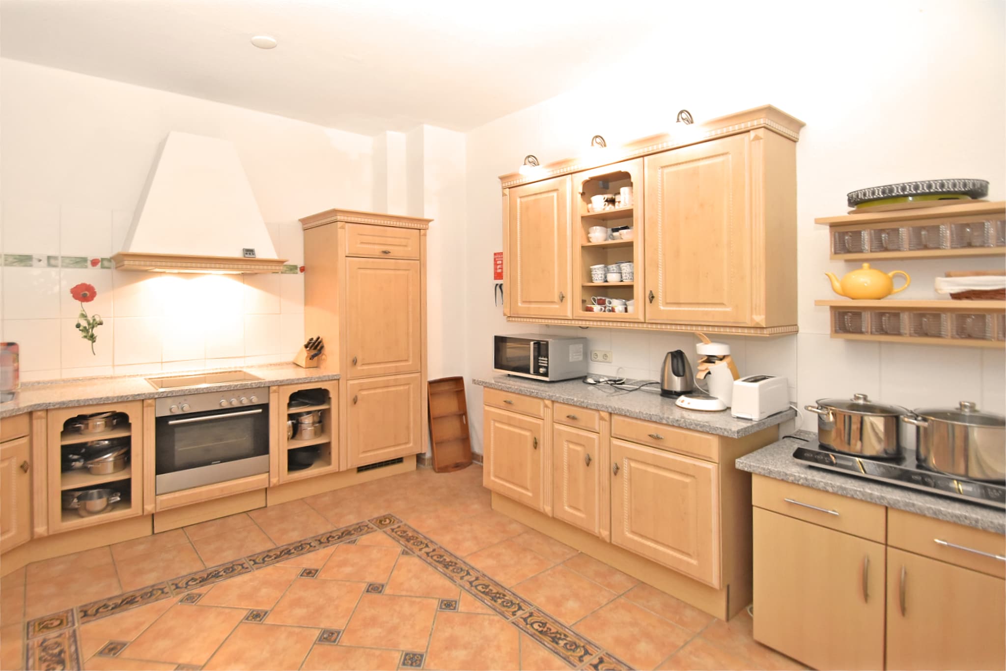 Ground floor: (Entrance, hall, Living room(TV, DVD player, stereo unit), dining room(dining table(18 persons)), Kitchen(electric kettle, toaster, cooker(4 ring stoves, ceramic, electric), cooker(2 ring stoves, induction), coffee machine(filter), oven(grill-oven), microwave, dishwasher, fridge-freezer), bedroom(single bed(80 x 190 cm), bunk bed(90 x 200 cm)), walk-through bedroom(bunk bed, cot), bathroom(bath tub, shower, washbasin, toilet), toilet(washbasin, toilet))\n\nOn the 1st floor: (bedroom(2x single bed(90 x 200 cm)), bedroom(single bed(90 x 200 cm), double bed(180 x 210 cm), cot), bedroom(double bed(180 x 200 cm), cot), bathroom(bath tub, shower, washbasin, toilet), bathroom(massage shower, infrared sauna, washbasin, washing machine), toilet(washbasin, toilet), Landing, playroom)\n\nOn the 2nd floor: (Living room(TV(satellite), DVD player), bedroom(single bed, double bed(160 x 200 cm)), bedroom(single bed(100 x 200 cm), double bed(180 x 200 cm)), bedroom(double bed(180 x 200 cm)), bathroom(Bubble bath, massage shower, 2x washbasin), toilet(washbasin, toilet), Landing(table football))\n\nSitting room, recreation room, bunk bed, microwave, dishwasher, bathtub or shower, shower, steam shower, infrared sauna, washing machine, patio, heating(central), terrace, garden(fenced), garden furniture, BBQ, parking, trampoline, parasol, table tennis table, air hockey, 4x children\'s bed, 2x high chair, playpen, party games