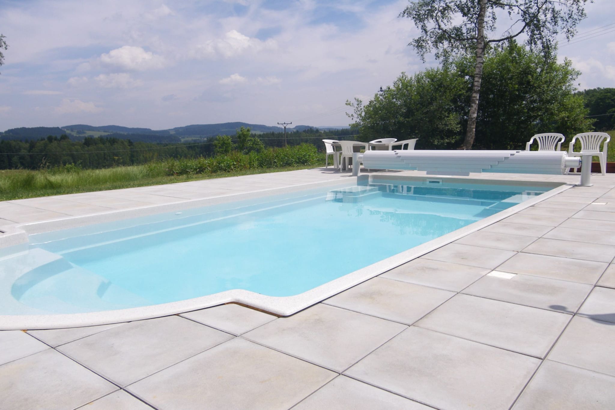 Close to the Lipno lake in lÃ¡bek, lies this 5-bedroom holiday home. Perfect for a group of 10 or families with children, it offers an infrared sauna to unwind and a private swimming pool to take a refreshing dive.

The Lipno Lake offers wonderful views and many activities like fishing, swimming, and water sports. There are several cycling and walking trails to explore. Culture lovers can visit the town centre at 2 km with the ambience of a bygone era. The supermarket and restaurants are at 2 km. You can enjoy the slopes of the Sumava Mountains during winter.

The holiday home is cosy with central heating, a spacious living room and a modern kitchen. There is a table football for recreation and a terrace to relax outdoors with a cool drink. Try your culinary skills over the barbecue in the furnished garden. Play equipment, trampoline, cot and high chair are available.

Public transport is at 500 m.

The rate for gas is 7.50 euros per cubic m and will be charged locally to the caretaker.