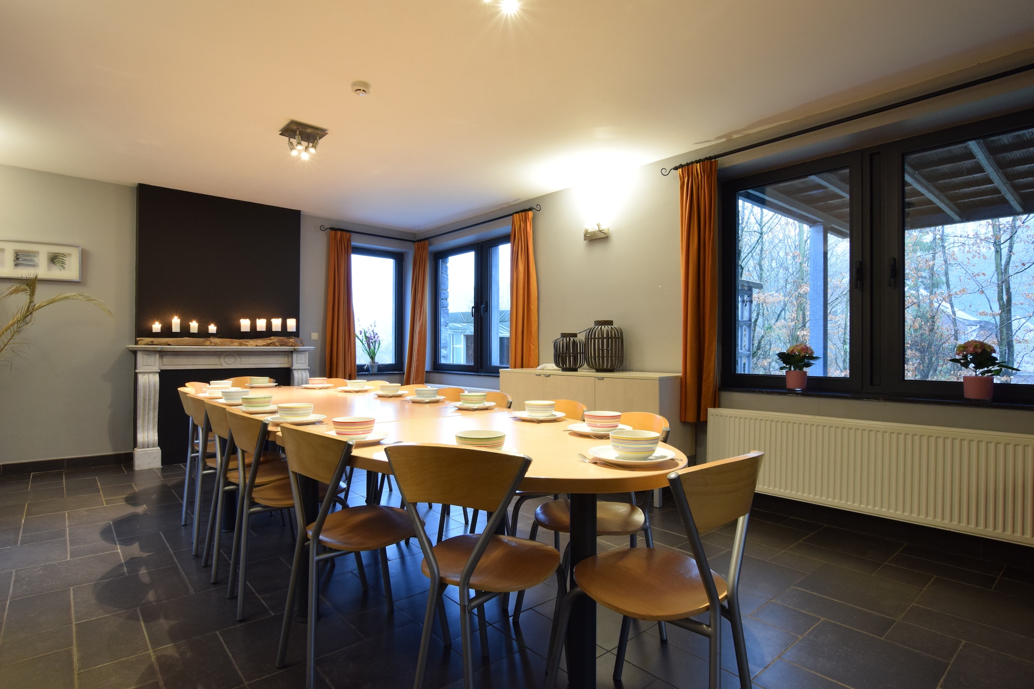 Ground floor: (Sitting room, Kitchen(electric kettle, toaster, cooker(electric), 3x coffee machine(filter, pads), oven, microwave, 2x dishwasher, fridge(+ ice machine, + freezer, american)), Living/diningroom(TV, dining table, DVD player))\n\nOn the 1st floor: (bedroom(2x single bed), bedroom(2x single bed), bathroom(bath tub, washbasin, toilet), bathroom(shower, washbasin, toilet))\n\nOn the 2nd floor: (Bedroom with bathroom(double bed, shower, washbasin), Bedroom with bathroom(double bed, TV, shower, washbasin))\n\nOn the 3rd floor: (bedroom(2x single bed, bunk bed), bedroom(2x single bed, bunk bed))\n\nheating(central), terrace, garden, garden furniture, BBQ, parking, tennis court(private)