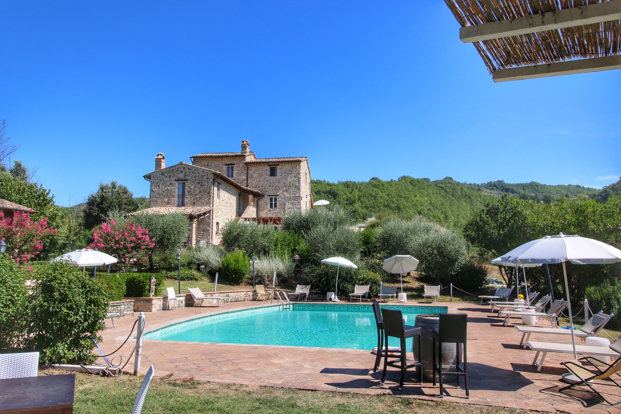 Rustiek appartement vlak bij Assisi, Umbria met zwembad