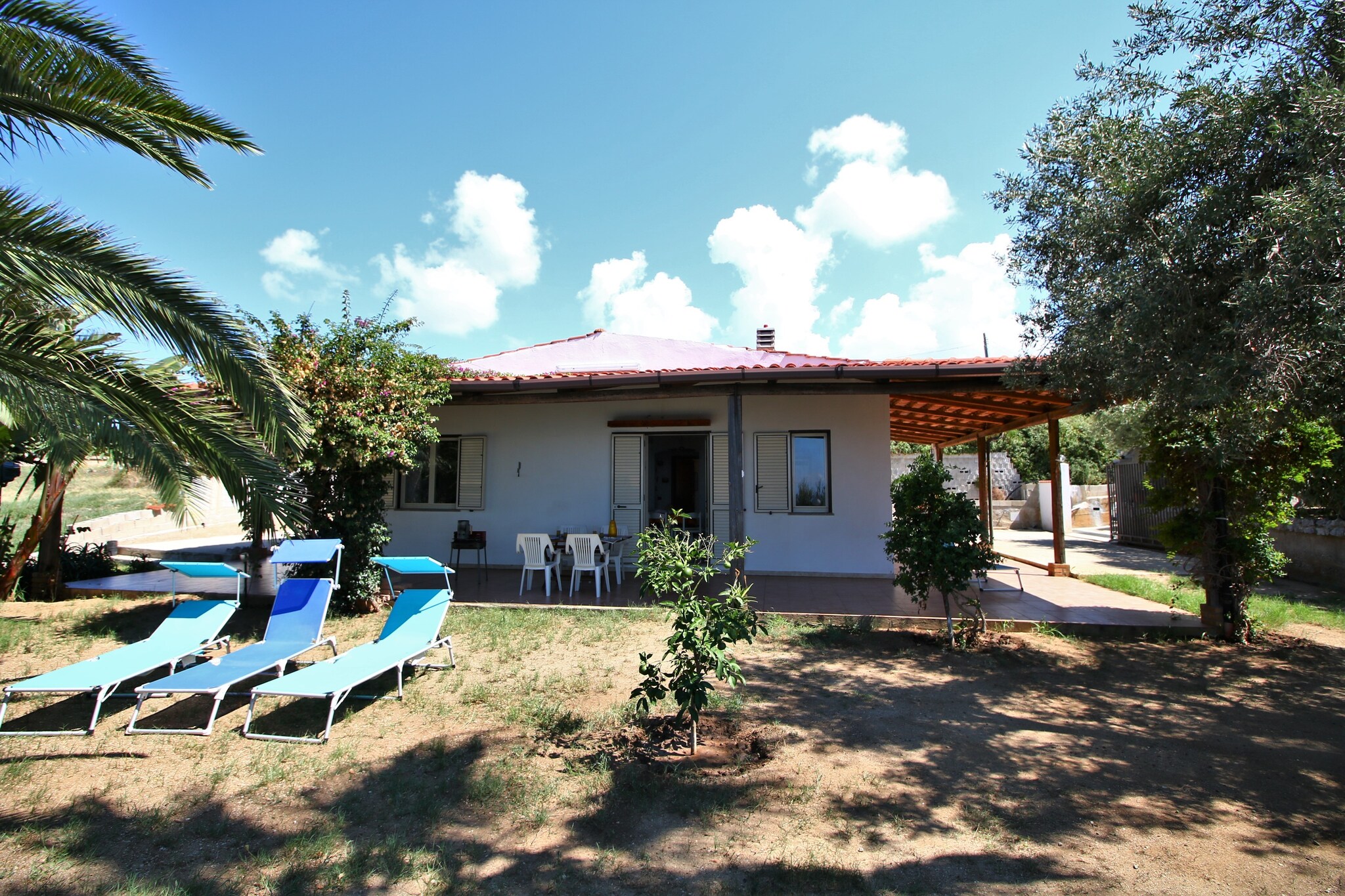 Located in Ricadi, this cosy holiday home features 2 bedrooms for 6 people. Suitable for a group of friends, guests can lounge in the private garden and access free WiFi at this property near the sea.
If you wish to enjoy a day under the sun enjoying the crashing waves, you can go to the beach 100 m away. You can also walk down to the town centre 800 m away, where you can enjoy a scrumptious meal. One of the most beautiful villages in Italy, famous beach, S. Maria del Mare church, Norman cathedral is a must-visit.
Guests can enjoy a delicious meal in the open air on the terrace. The airy and spacious lawns around the property combined with the sea breeze provide a relaxing stay here. The kitchen is equipped with a microwave and dishwasher. A cot is available at a small fee. Parking is also available on the premises.