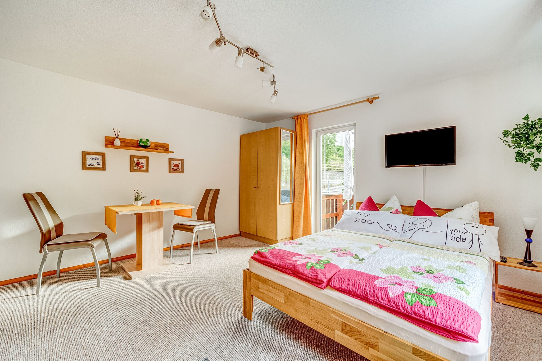 Cozy Mountain Escape
Nestled in the tranquil village of Schleusegrund, this holiday home offers an intimate retreat for two. The combined living and bedroom space features a double bed, a wood stove, and a flat-screen TV, creating a warm and inviting atmosphere. Step out to the balcony with your morning coffee or unwind in the furnished garden with a glass of wine while enjoying the peaceful surroundings.

Activities & Local Exploration
The Thuringian mountains offer year-round outdoor adventures. Hiking and cycling paths surround the village, while nearby pools provide refreshing dips during warmer months. Guests can explore the scenic region or plan day trips to nearby towns, combining nature with local culture. The wood-fired stove ensures cozy comfort after active days outdoors, making the home ideal for couples or friends seeking quiet relaxation.

Dining & Convenience
Restaurants and supermarkets are just 3 km away, offering local dishes and groceries for self-catering. The kitchen is fully equipped for culinary experiments, and the BBQ in the garden allows for casual outdoor meals. With parking on-site and public transport only 100 meters away, this home balances convenience with seclusion, making it a peaceful base to enjoy both the scenic and cultural highlights of the Thuringian Forest.