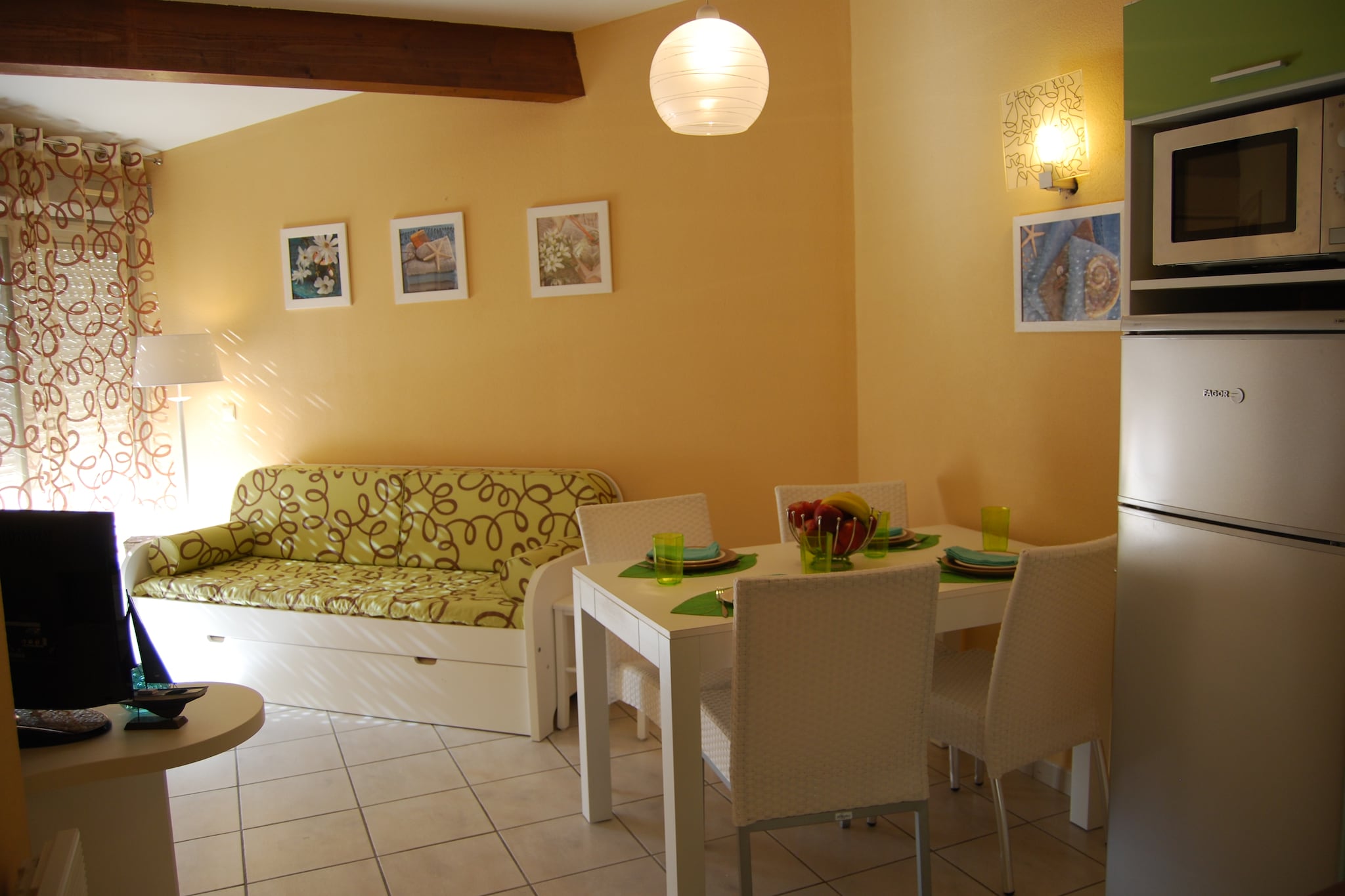 Coastal Comfort with a Sunny Terrace
Set within the lush grounds of Jardins de Neptune, this bright and cheerful apartment offers a relaxed retreat just moments from the sparkling shores of St Cyprien Plage. Thoughtfully furnished with a cozy living/dining area, a fully equipped kitchenette with ceramic hob, microwave, and dishwasher, plus a comfortable bedroom with twin beds, this space is ideal for couples or solo travelers. Step out to your private balcony or terrace, complete with garden furnitureâ€”perfect for morning coffee or sunset lounging.

Prime Location Steps from the Beach
Located in the heart of the Languedoc-Roussillon region, you're just a short walk from sandy beaches, charming marina promenades, and bustling local markets. Take a dip in the shared outdoor pool (open June to early September), rent bikes to explore the coastline, or hop over to Aqualand or the Reserve Africaine de Sigean for a fun day out. This apartment also includes optional air conditioning for added summer comfort.

Pet-Friendly Paradise by the Sea
Bring your four-legged companionâ€”this area is known for being wonderfully pet-friendly! Enjoy scenic walks along the Tech River, dog-welcoming stretches of St Cyprien Beach, and several pet-accepting cafÃ©s nearby like Les Galets and Le P'tit Bateau. Whether you're strolling the boardwalk or relaxing by your terrace, there's plenty to enjoy together.