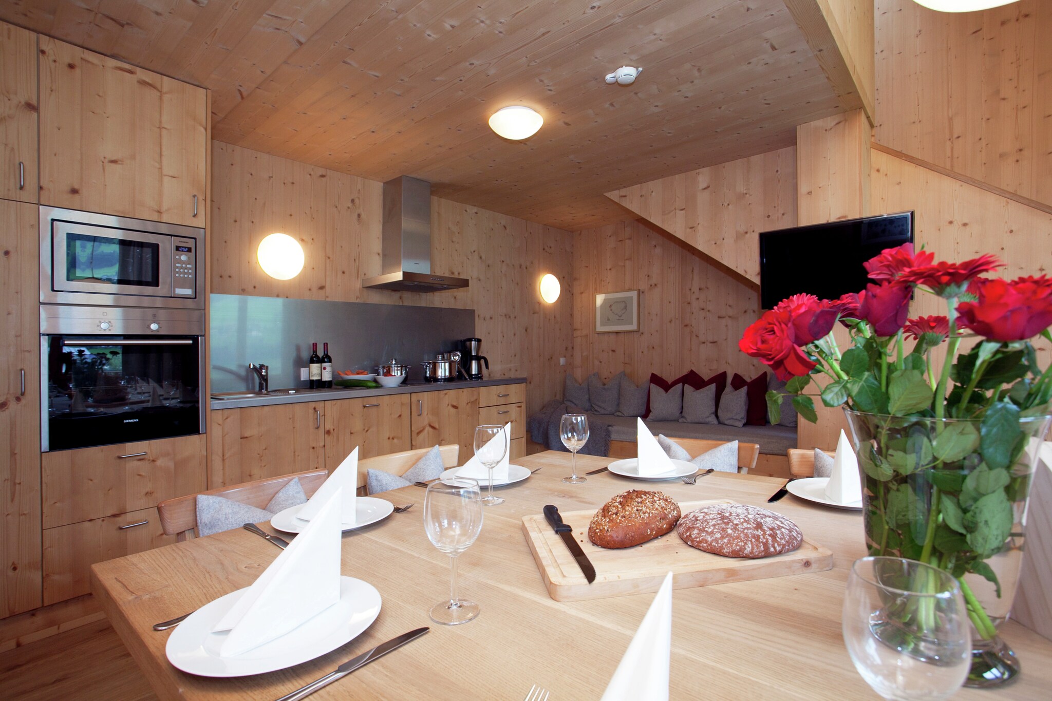 Ground floor: (ski storage(ski boot heaters))\n\nOn the 1st floor: (Living room(TV(satellite), dining table, radio, CD player), open kitchen(electric kettle, cooker, coffee machine, oven, microwave, dishwasher, fridge-freezer), bedroom(double bed), toilet(washbasin, toilet))\n\nOn the 2nd floor: (bedroom(double bed, TV(satellite)), bedroom(double bed), bedroom(double bed), bedroom(double bed), bathroom(shower, washbasin, toilet, hairdryer), bathroom(shower, washbasin, toilet))\n\ngarage, infrared sauna, heating(floor heating), terrace(65 m2), garden, garden furniture, BBQ, parking, children\'s bed, high chair