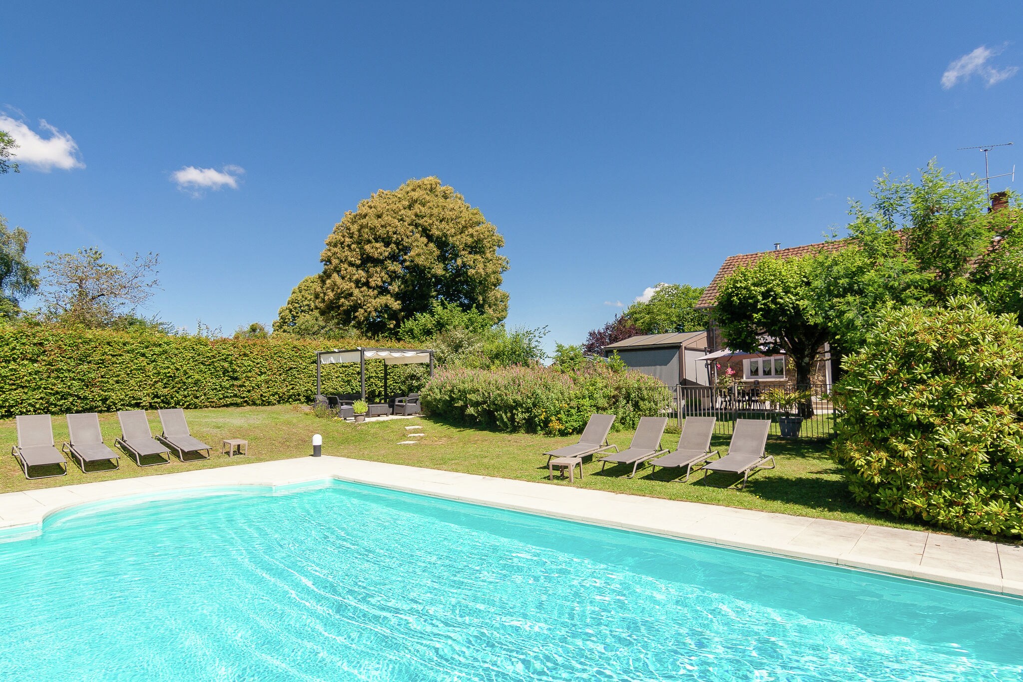 Sunny Holiday Home in Meilhards with Swimming Pool