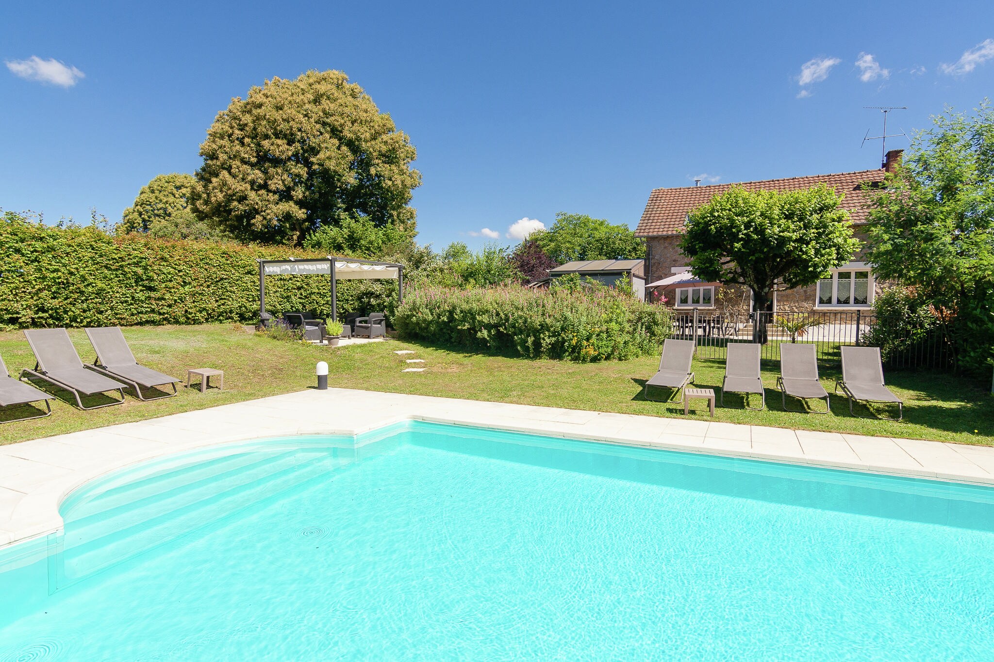 Sunny Holiday Home in Meilhards with Swimming Pool