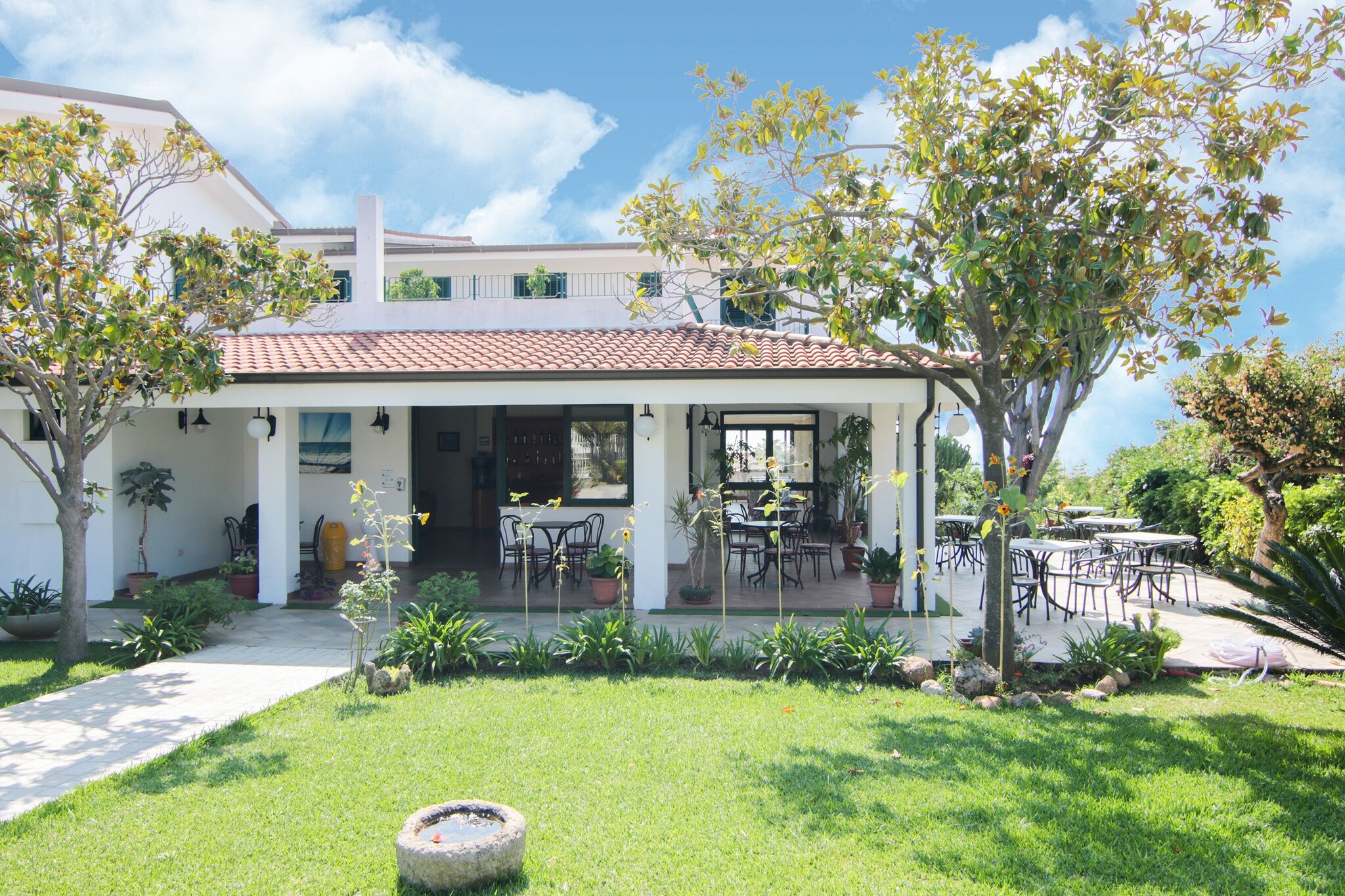 Ground floor: (Large kitchen(dining table, hob, cooker, hood, espresso machine, oven, fridge-freezer, Juicer), bedroom(double bed, air conditioning), bedroom(2x single bed, air conditioning), bathroom(shower, washbasin, toilet, bidet), terrace, garden furniture)\n\nparking, swimming pool(shared with other guests, 20 x 12 m., opened from May upto and including Oct), tennis court, football goal