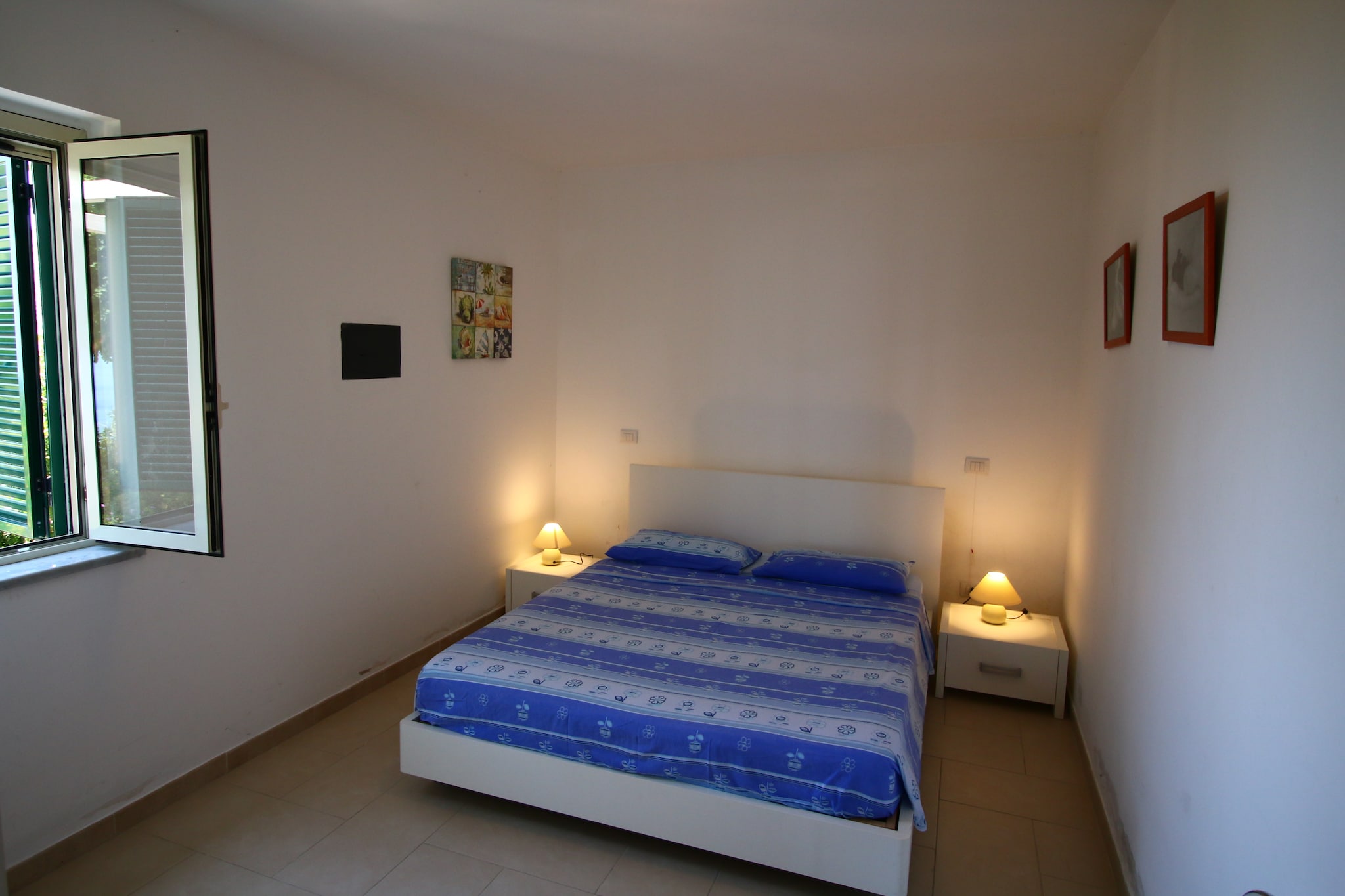 Ground floor: (Living room(TV, dining table, seating area, air conditioning), open kitchen(electric kettle, cooker(gas), coffee machine(filter), oven, combination microwave, dishwasher, fridge-freezer), bedroom(double bed(190 x 200 cm), air conditioning), bedroom(double bed(190 x 200 cm), air conditioning), bathroom(shower, washbasin, toilet))\n\nstorage(washing machine), terrace, garden furniture, swimming pool(shared with other guests)